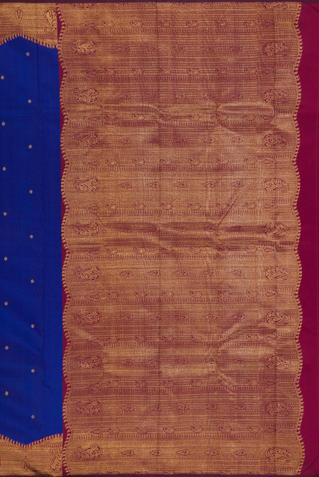 Close up image of the pallu of Pure Silk Pure Zari Royal Blue Kanjivaram Saree with Zari Butta on the body and Fancy Border. 