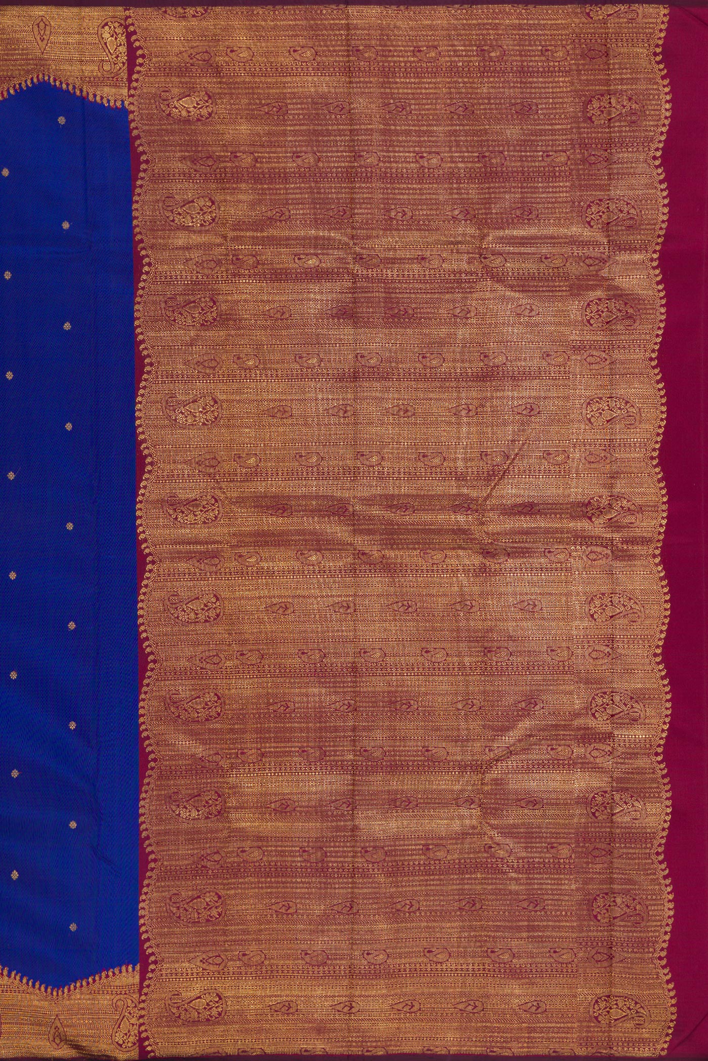 Close up image of the pallu of Pure Silk Pure Zari Royal Blue Kanjivaram Saree with Zari Butta on the body and Fancy Border. 