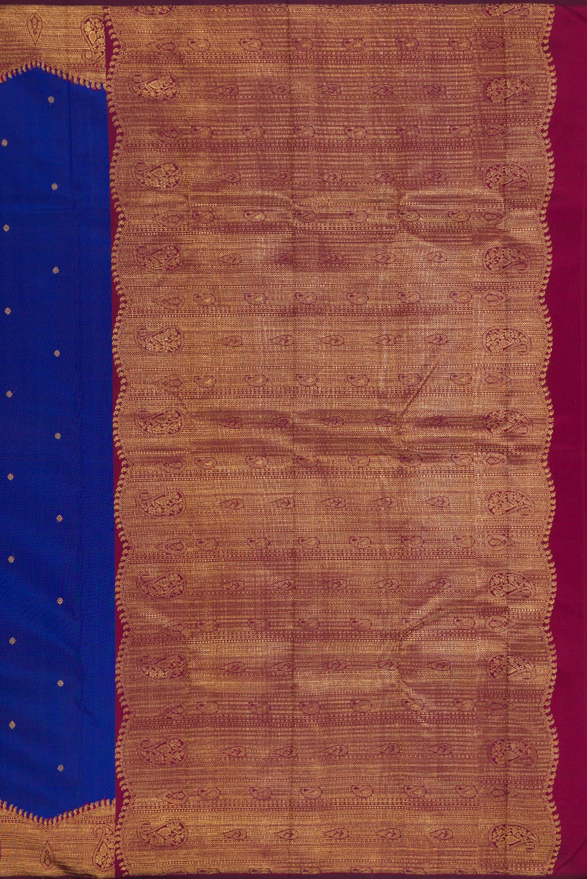 Close up image of the pallu of Pure Silk Pure Zari Royal Blue Kanjivaram Saree with Zari Butta on the body and Fancy Border. 