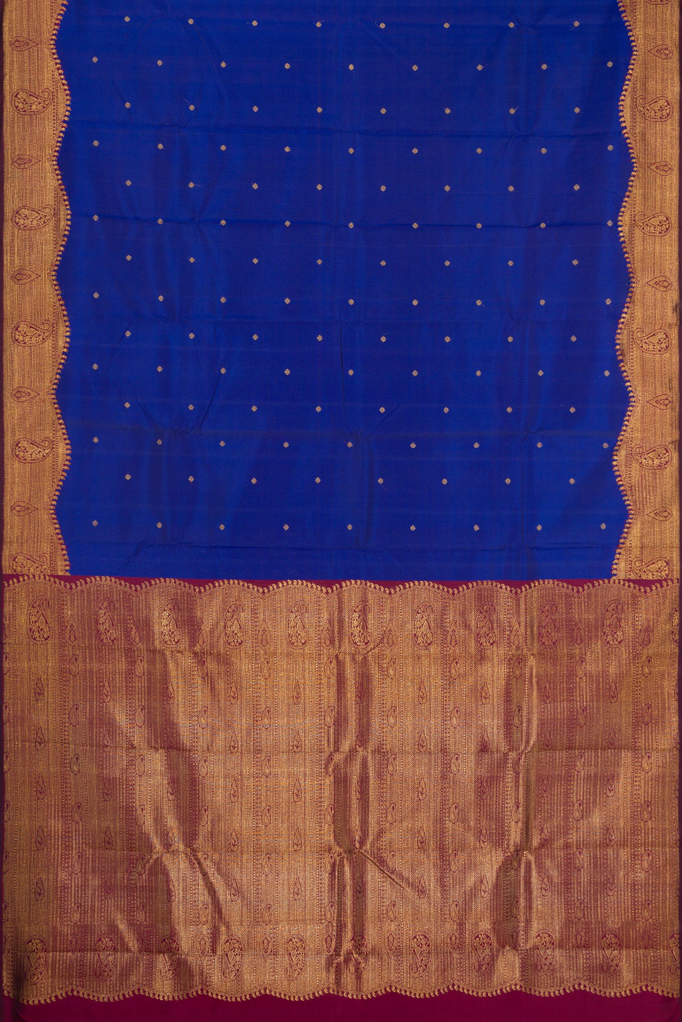 Flat view of Pure Silk Pure Zari Royal Blue Kanjivaram Saree with Zari Butta on the body and Fancy Border. 