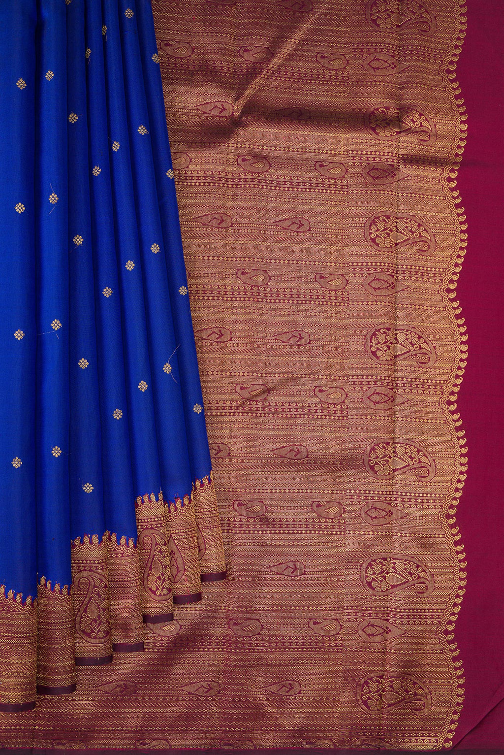 Pleats and pallu of Pure Silk Pure Zari Royal Blue Kanjivaram Saree with Zari Butta on the body and Fancy Border. 