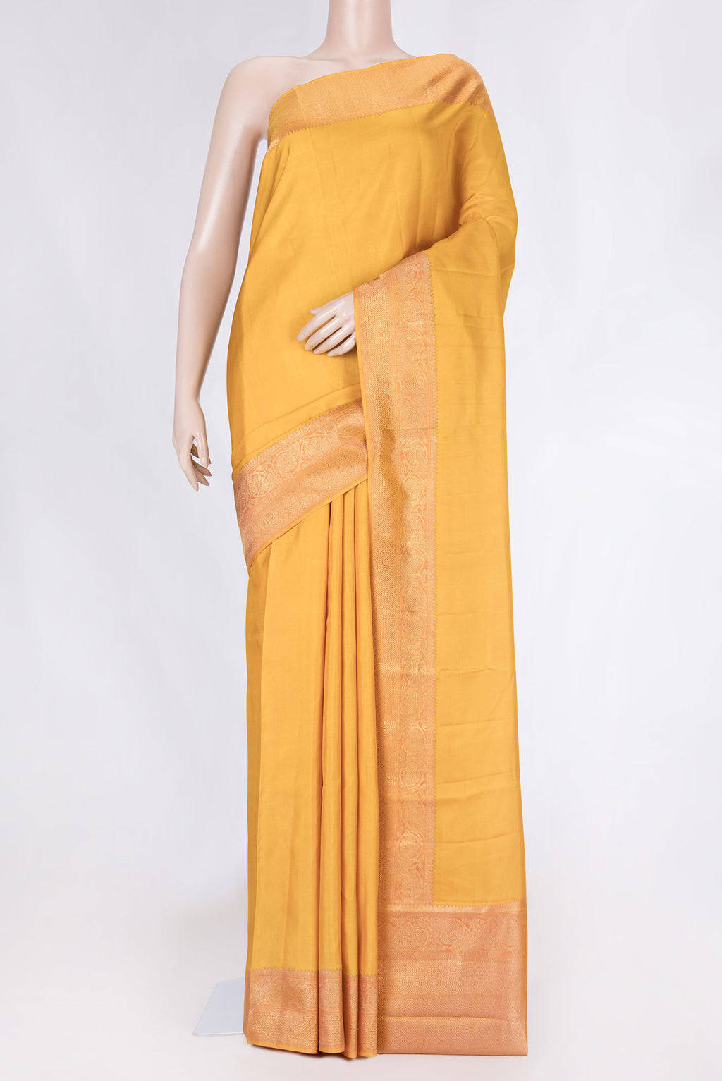 Pure Silk Pure Zari Mustard Dual Tone Kanchipuram Saree with Plain Body and Zari Border displayed on a mannequin