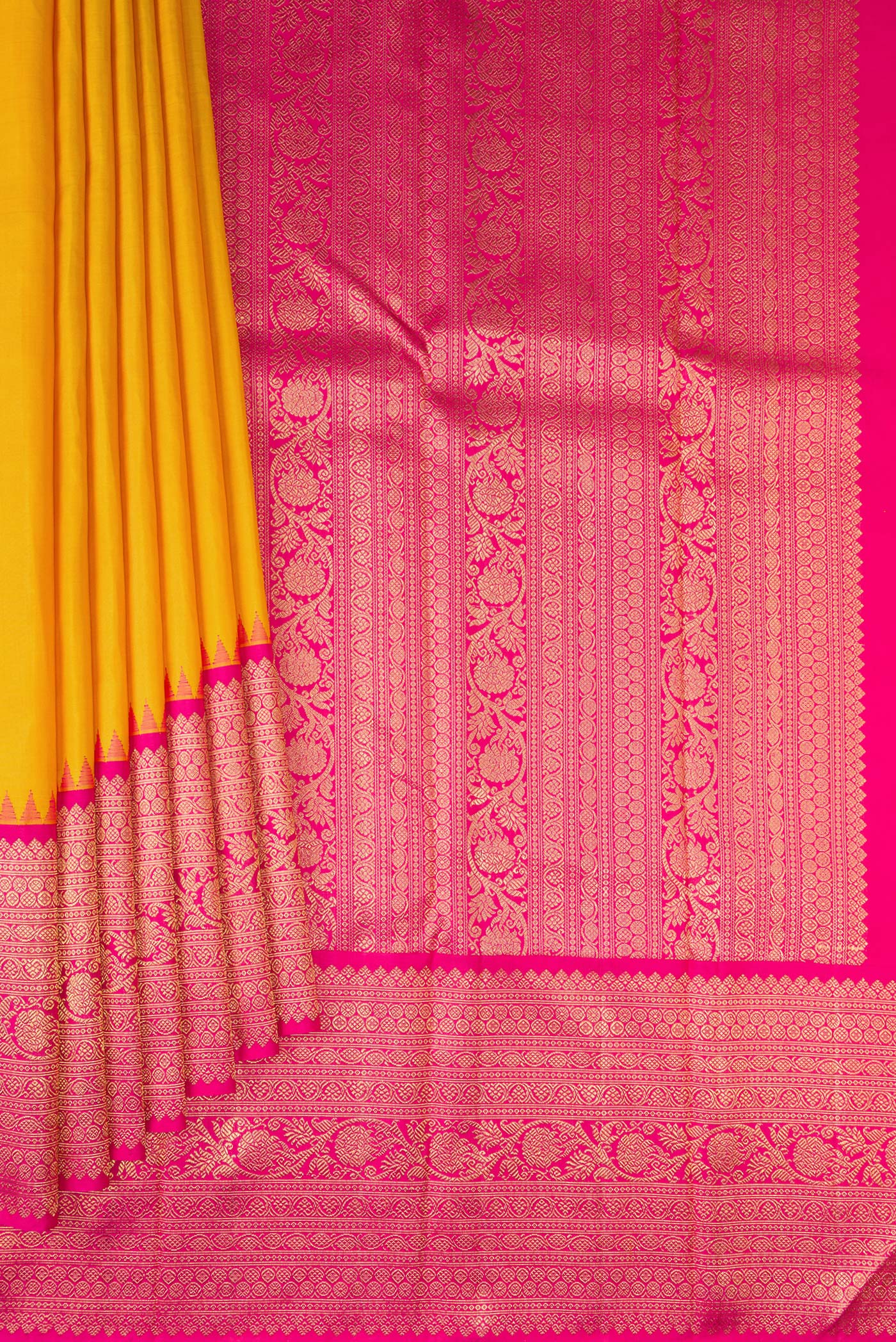 Pleats and pallu of Pure Silk Pure Zari Yellow Kanjivaram Saree with Plain Body and Fancy Border. 
