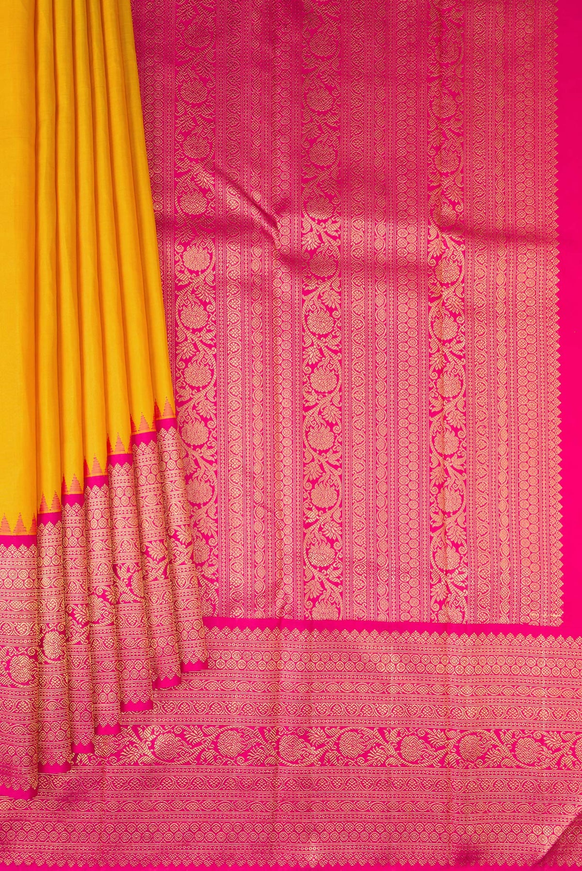 Pleats and pallu of Pure Silk Pure Zari Yellow Kanjivaram Saree with Plain Body and Fancy Border. 