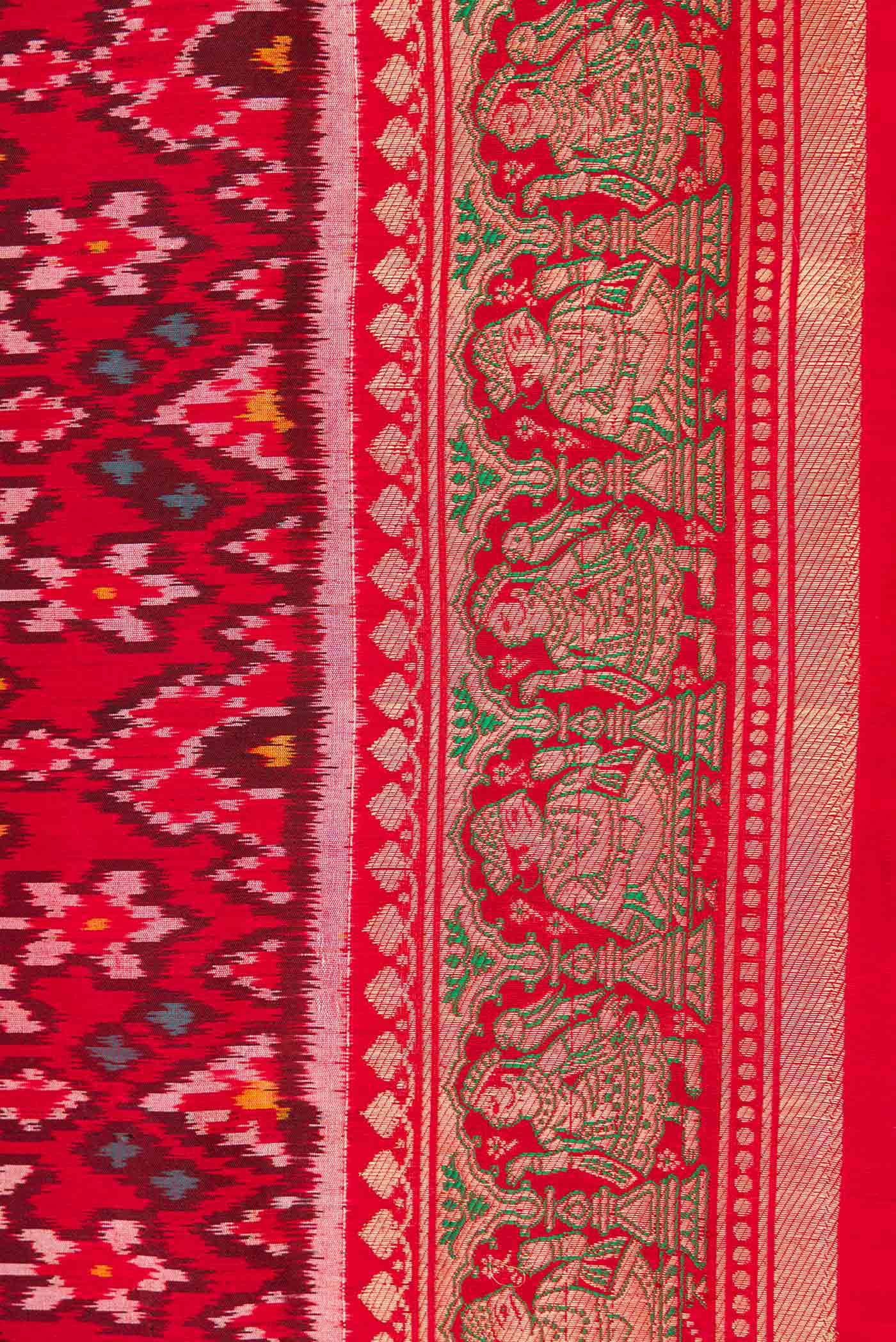 Border image of Pure Silk Pure Zari Red Dual Tone Double Ikat Saree with Ikat Print on the body and Fancy Border
