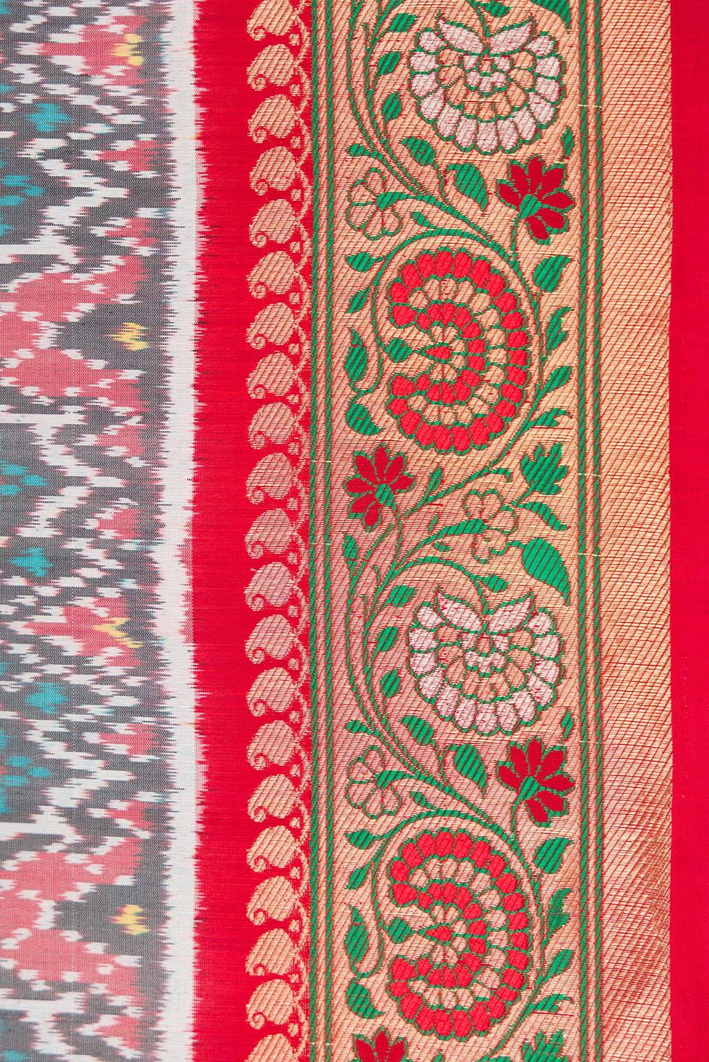 Border image of Grey Dual Tone Double Ikat Saree with Ikat Print on the body and Zari Border. 