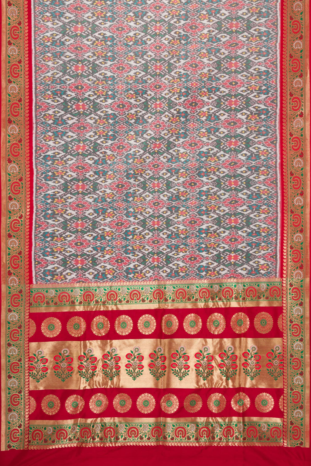 Flat view of Grey Dual Tone Double Ikat Saree with Ikat Print on the body and Zari Border. 