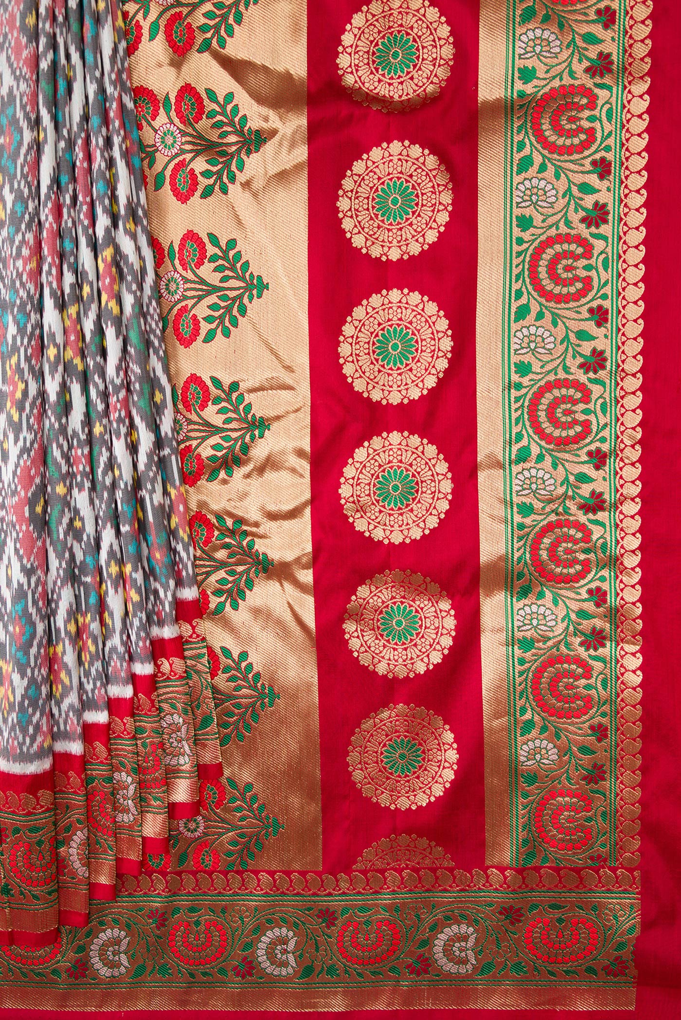 Pleats and pallu of Grey Dual Tone Double Ikat Saree with Ikat Print on the body and Zari Border. 