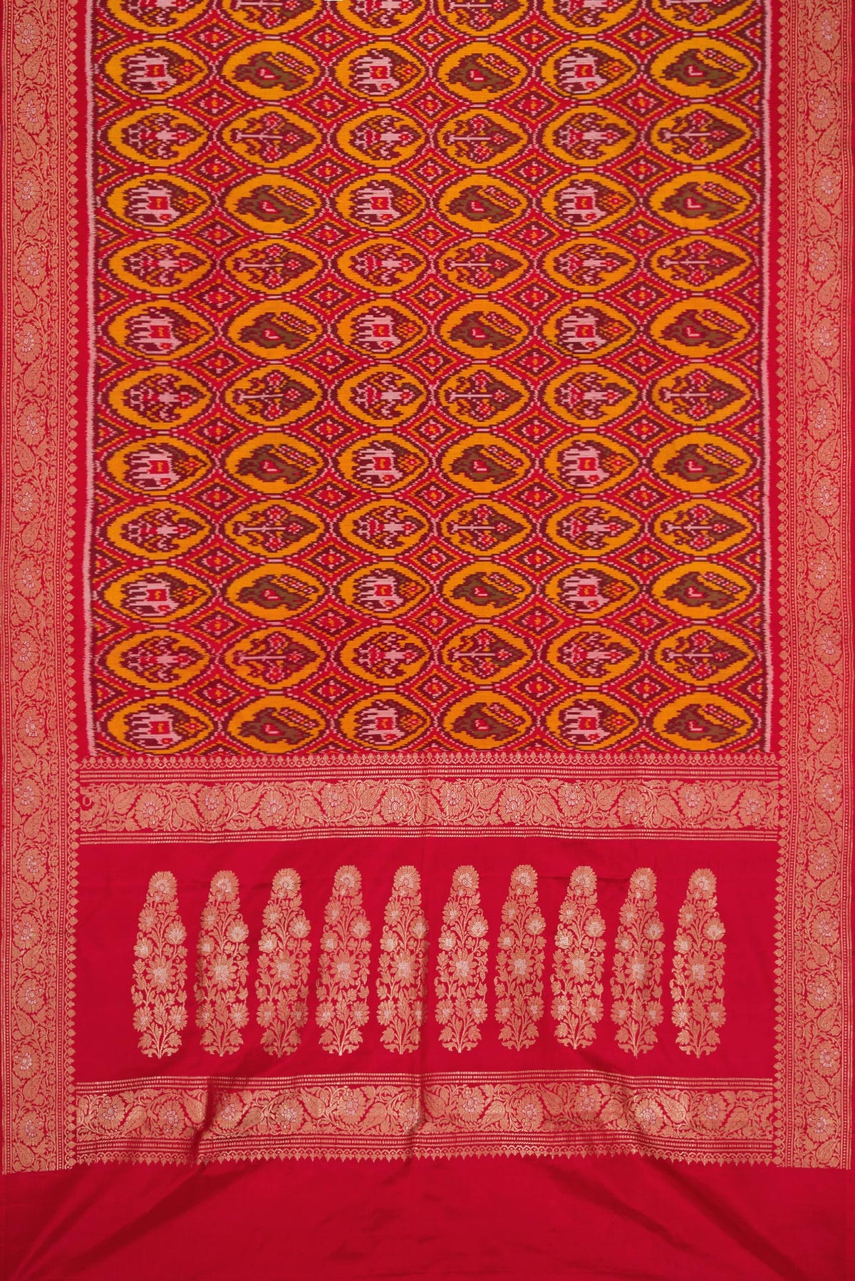 Flat view of Red Dual Tone Double Ikat Saree with Ikat Print on the body and Zari Border. 