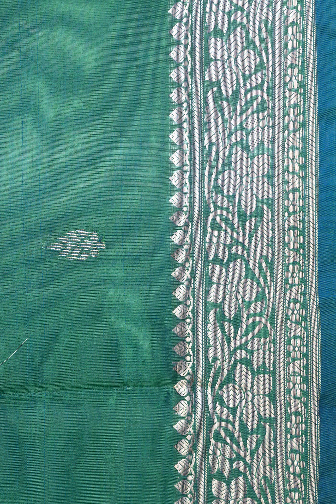 Border image of Green Dual Tone Banarasi Silk Saree with Zari Butta on the body and Zari Border. 