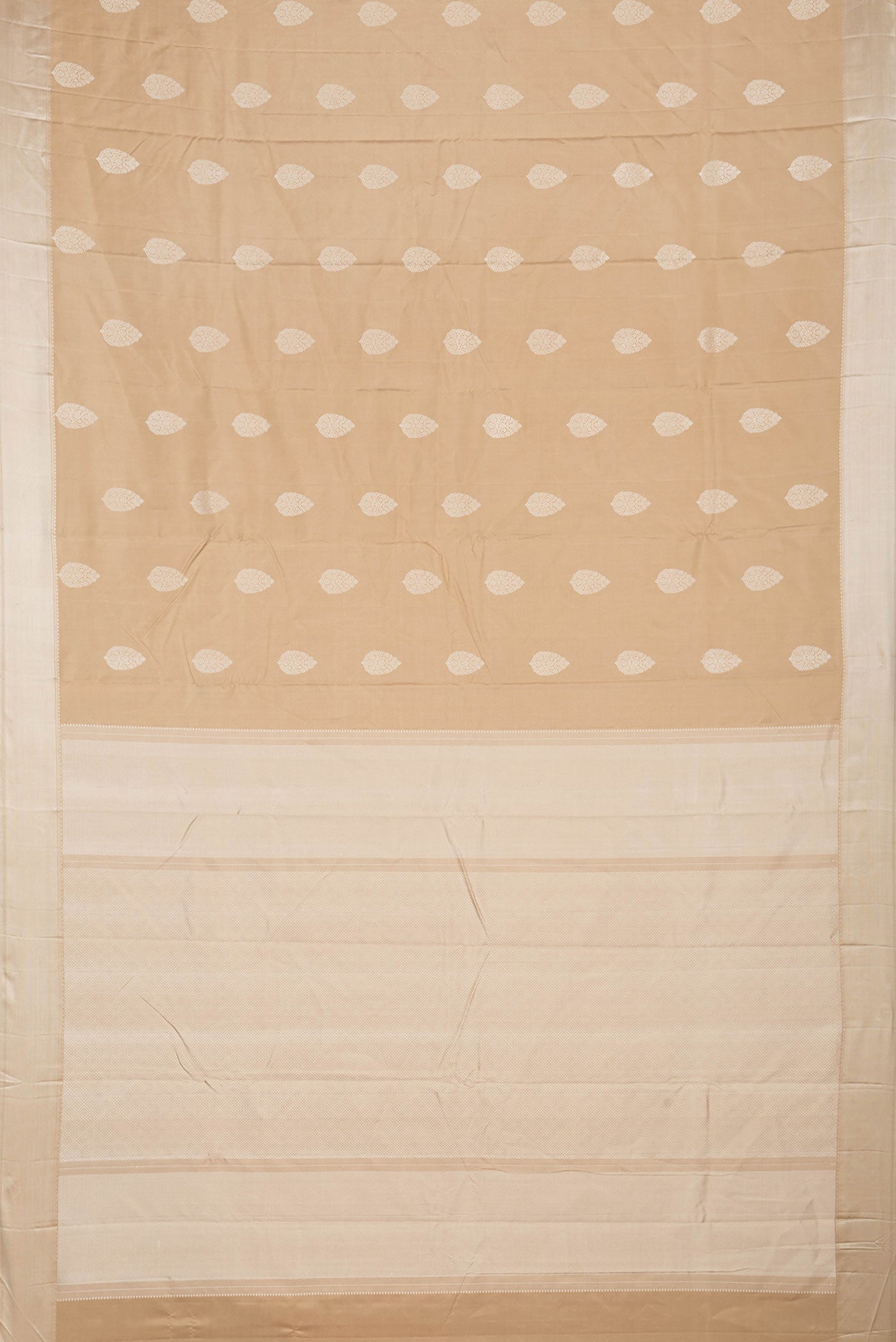 Flat view of Beige Dual Tone Kanjivaram Saree with Thread Butta on the body and Thread Border. 