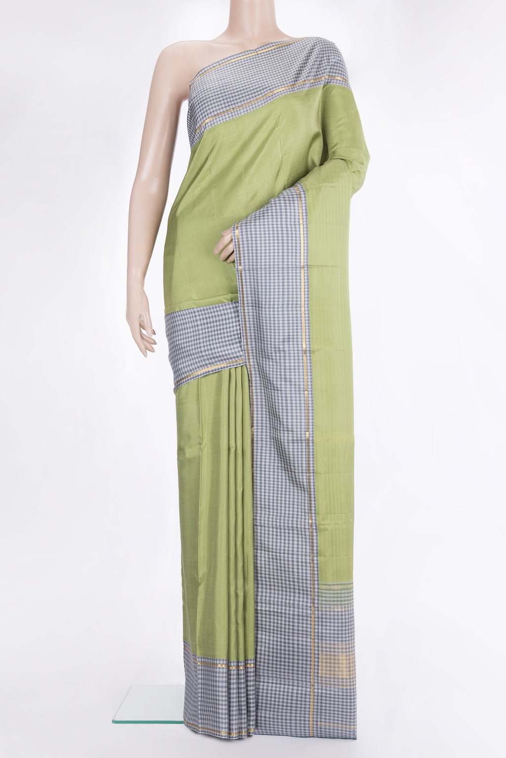 Pure Silk Pista Green Dual Tone Kanjivaram Saree with Plain Body and Checks Border.  displayed on a mannequin