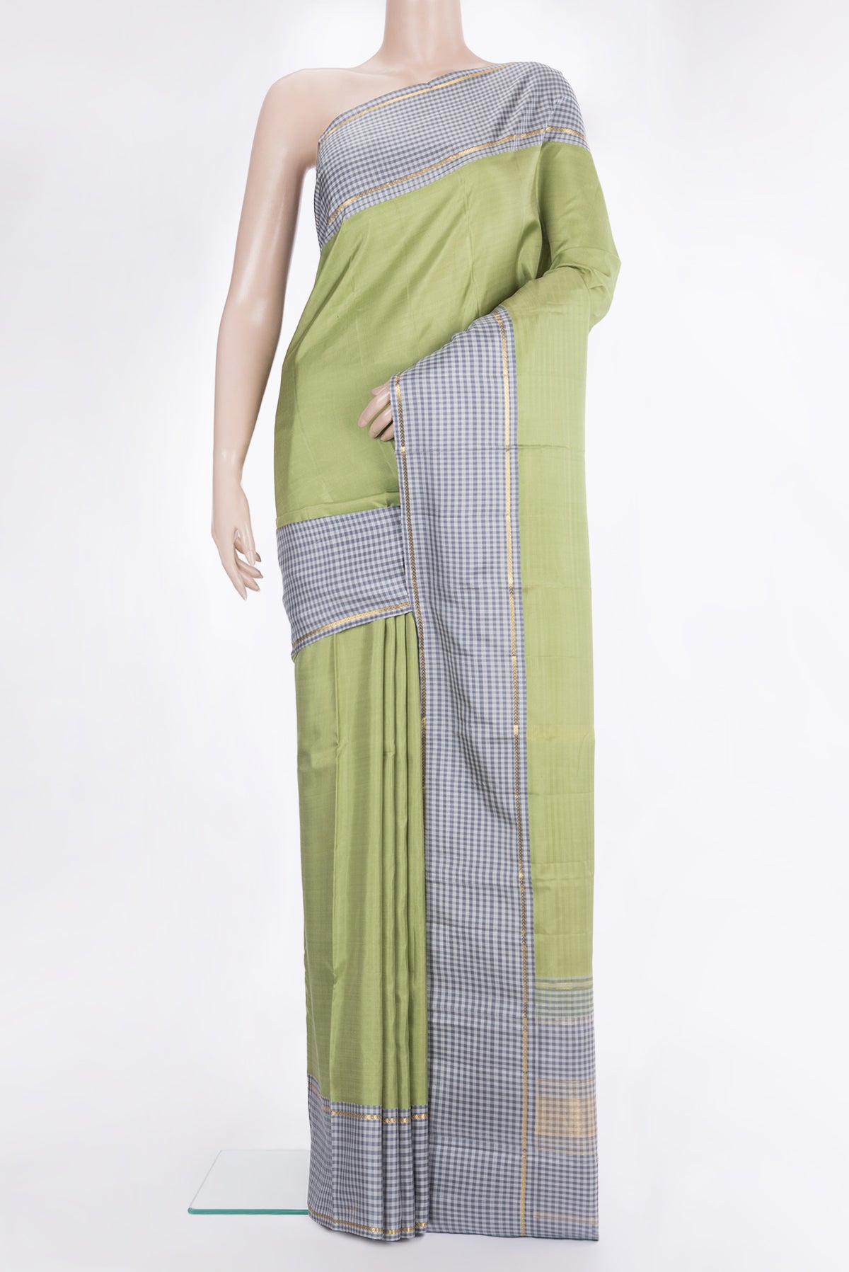Pure Silk Pista Green Dual Tone Kanjivaram Saree with Plain Body and Checks Border.  displayed on a mannequin
