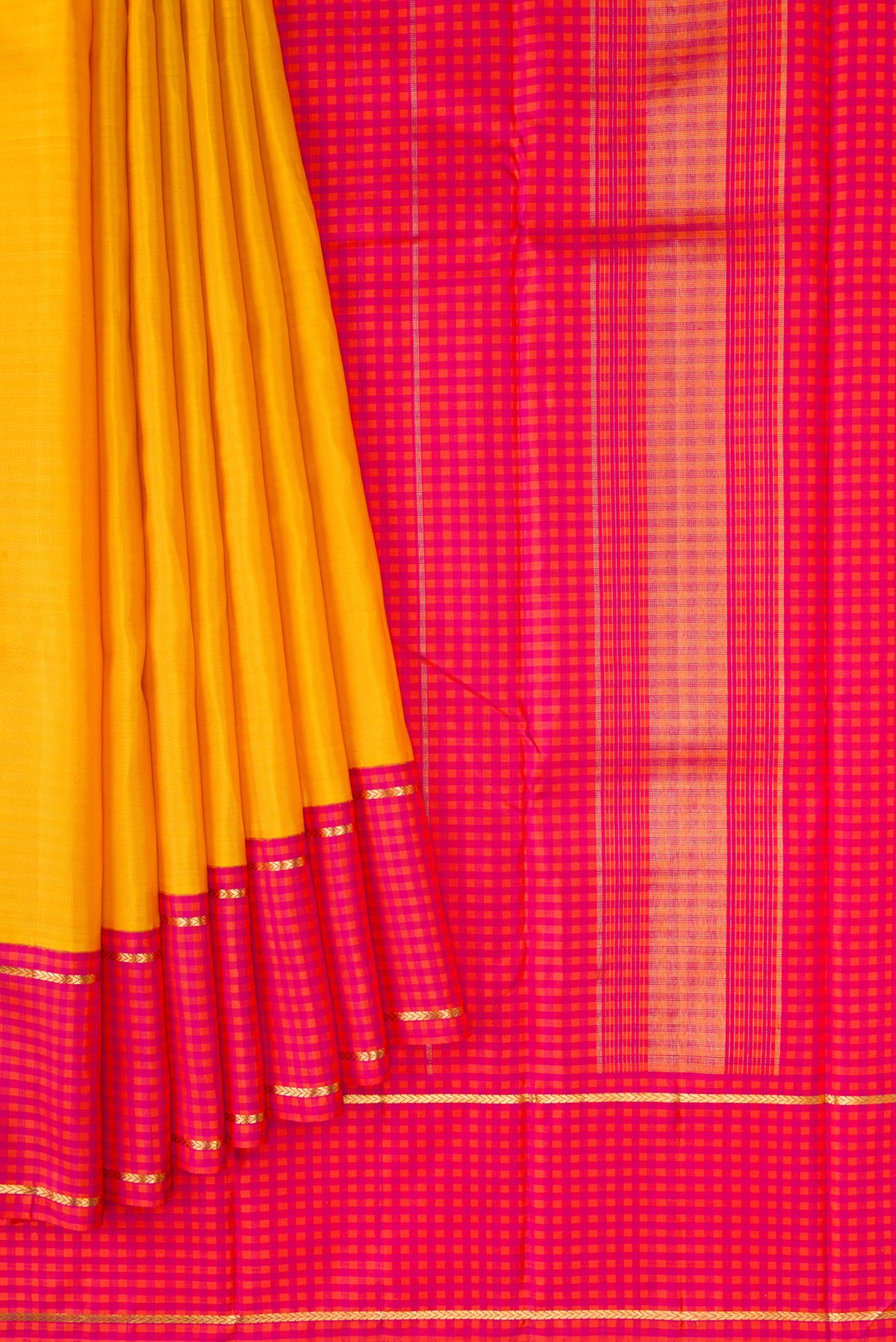 Pleats and pallu of Pure Silk Pure Zari Yellow Dual Tone Kanjivaram Saree with Plain Body and Checks Border. 