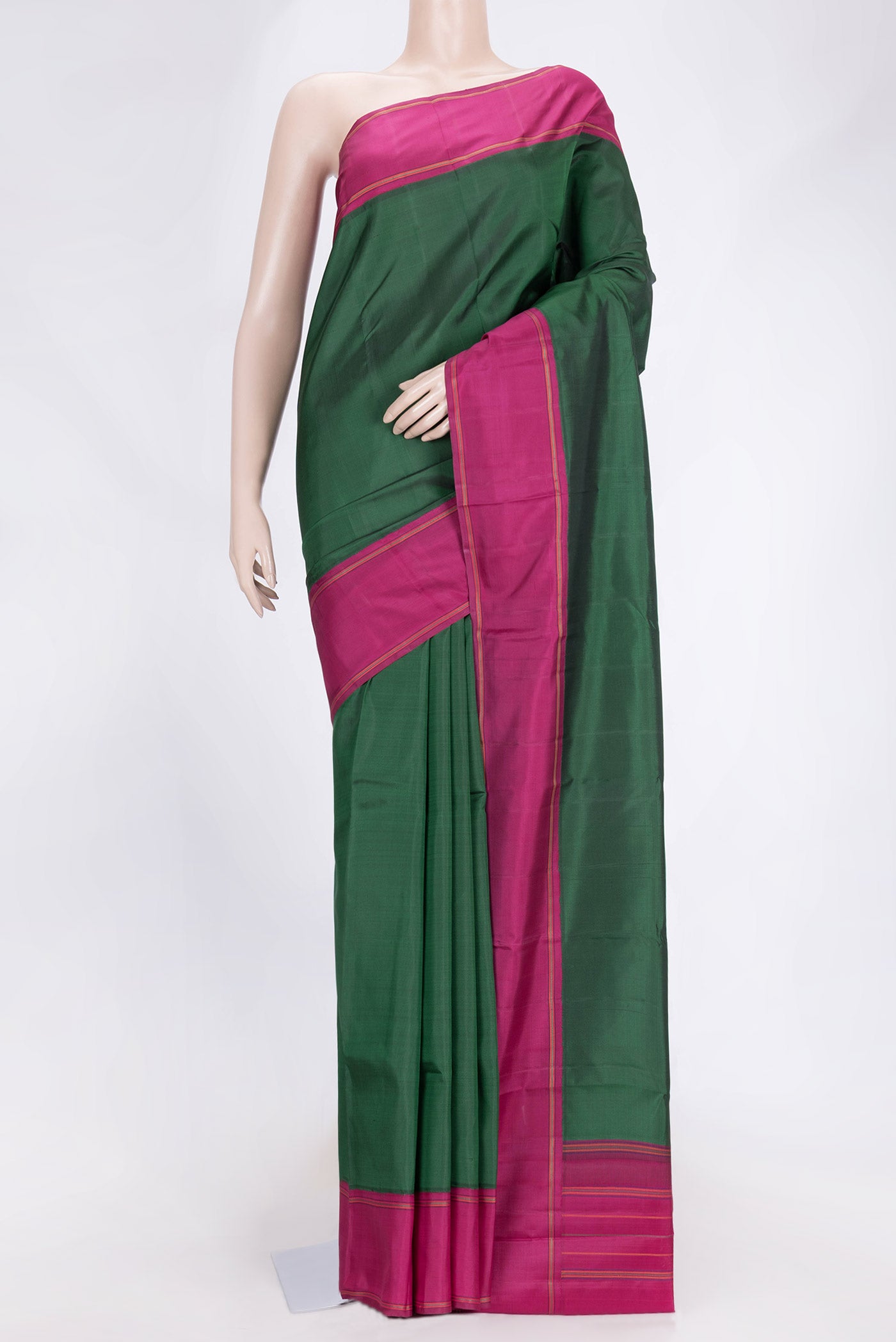 Green Dual Tone Kanjivaram Saree with Plain Body and Plain Border.  displayed on a mannequin