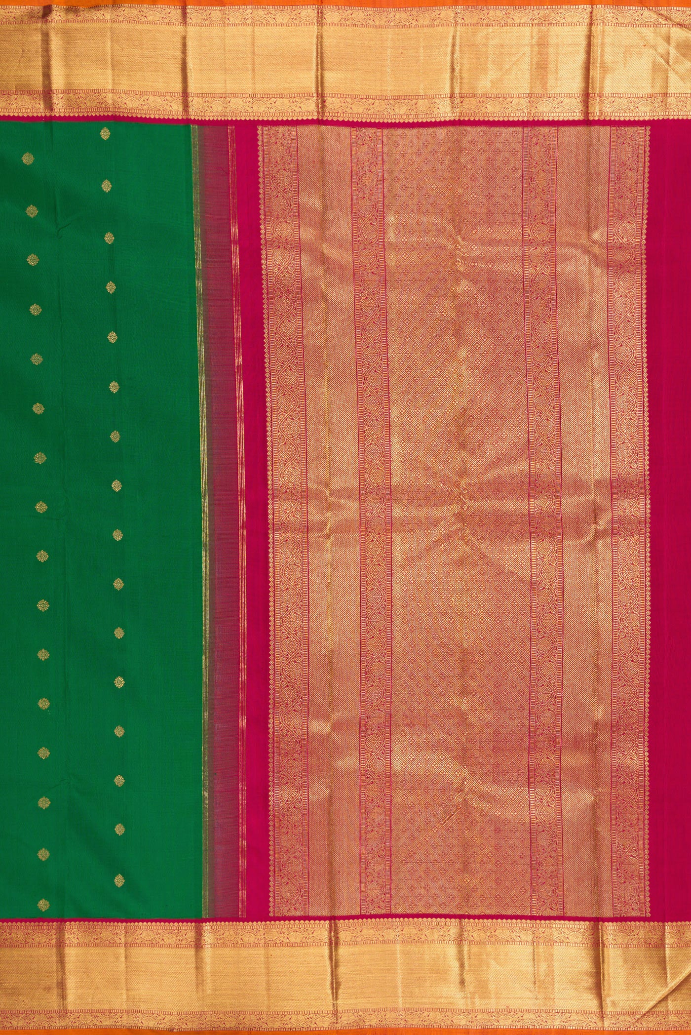 Close up image of the pallu of Pure Silk Pure Zari Green Kanjivaram Saree with Zari Butta on the body and Zari Border. 