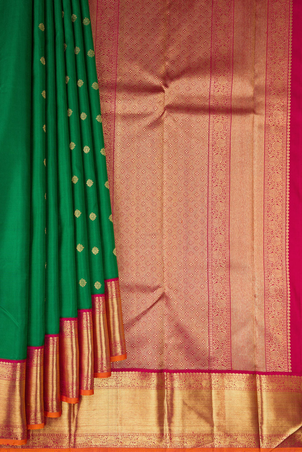 Pleats and pallu of Pure Silk Pure Zari Green Kanjivaram Saree with Zari Butta on the body and Zari Border. 