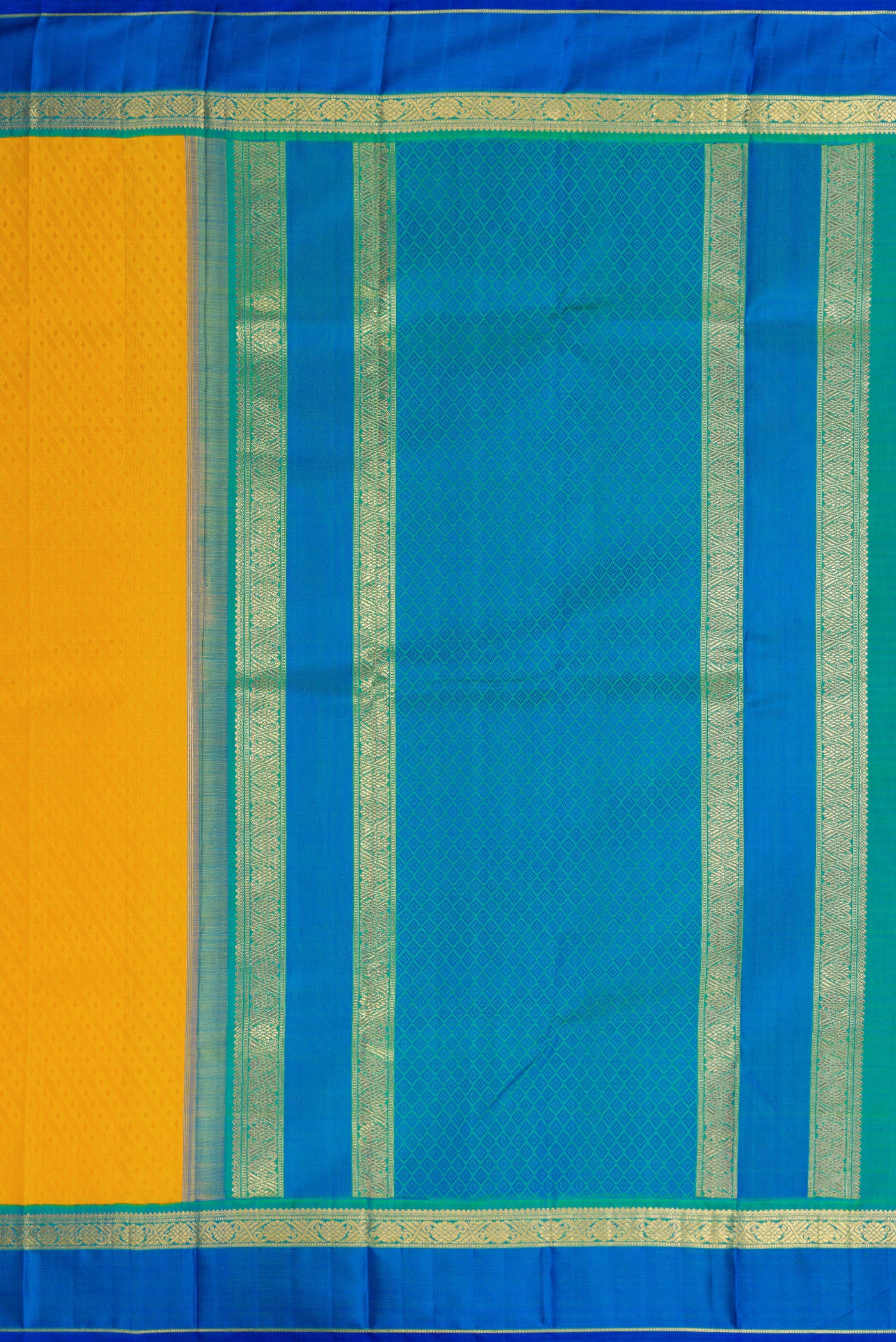 Close up image of the pallu of Pure Silk Pure Zari Mustard Dual Tone Kanchipuram Saree with Jacquard design on the body and Zari Border. 