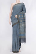 Grey Dual Tone Tussar Silk Saree with Printed design on the body and Zari Border displayed on a mannequin