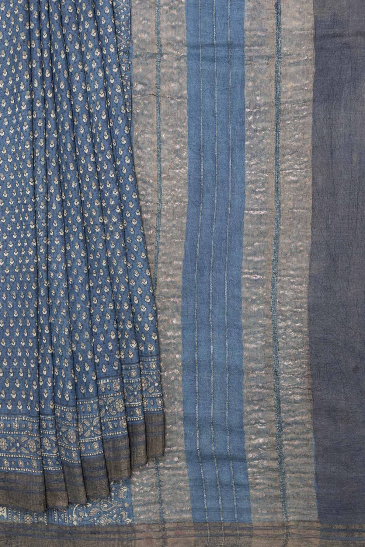 Pleats and pallu of Grey Dual Tone Tussar Silk Saree with Printed design on the body and Zari Border
