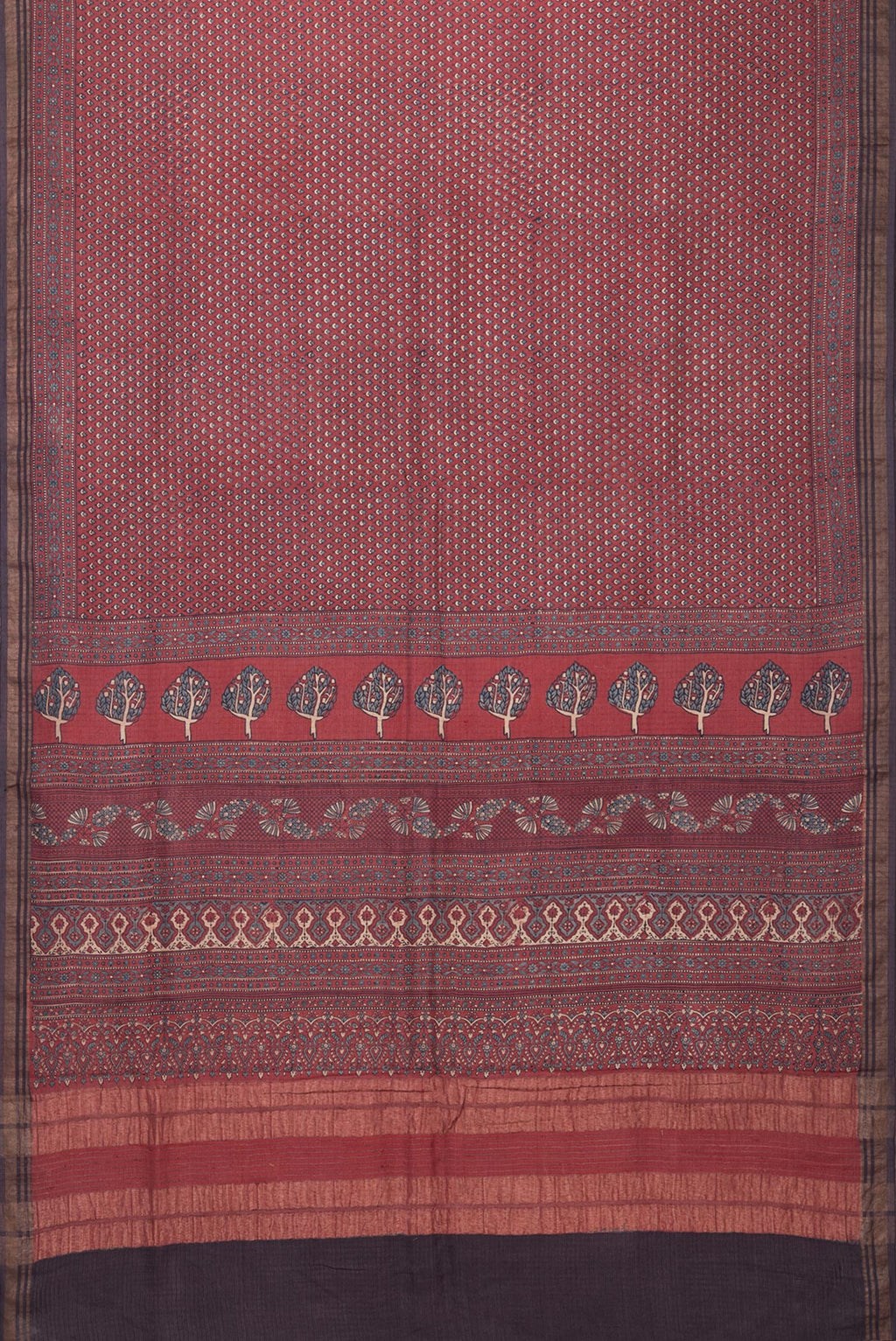 Flat view of Maroon Jute Silk Saree with Ajrakh Print on the body and Zari Border. 