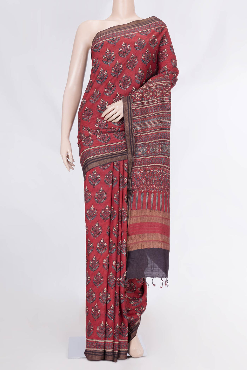 Maroon Dual Tone Tussar Silk Saree with Printed design on the body and Zari Border displayed on a mannequin