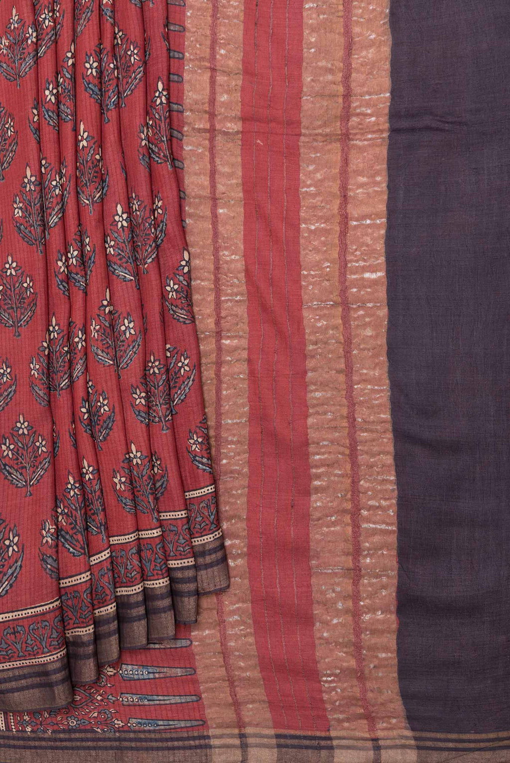 Pleats and pallu of Maroon Dual Tone Tussar Silk Saree with Printed design on the body and Zari Border