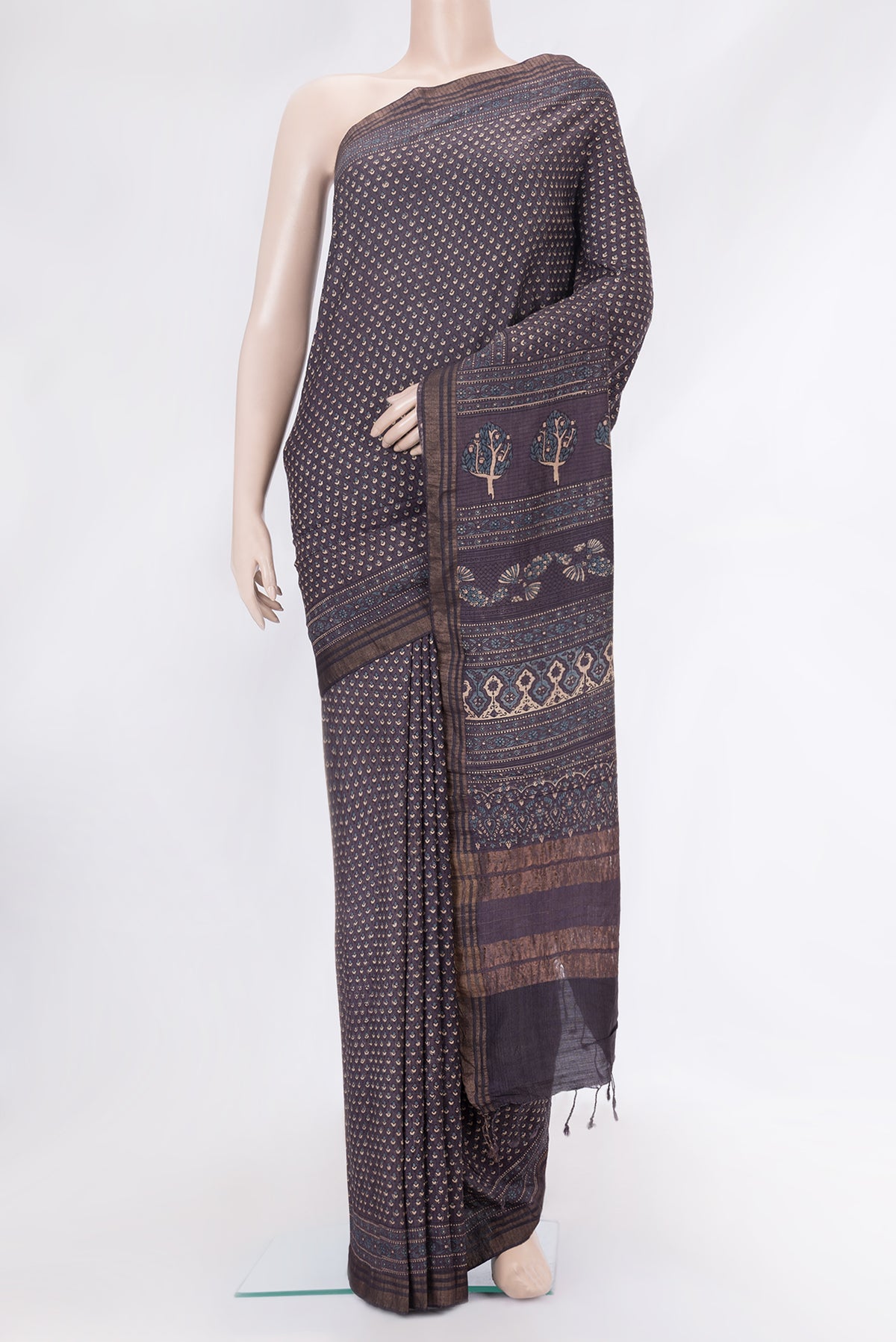 Purple Dual Tone Linen Saree with Printed design on the body and Zari Border.  displayed on a mannequin