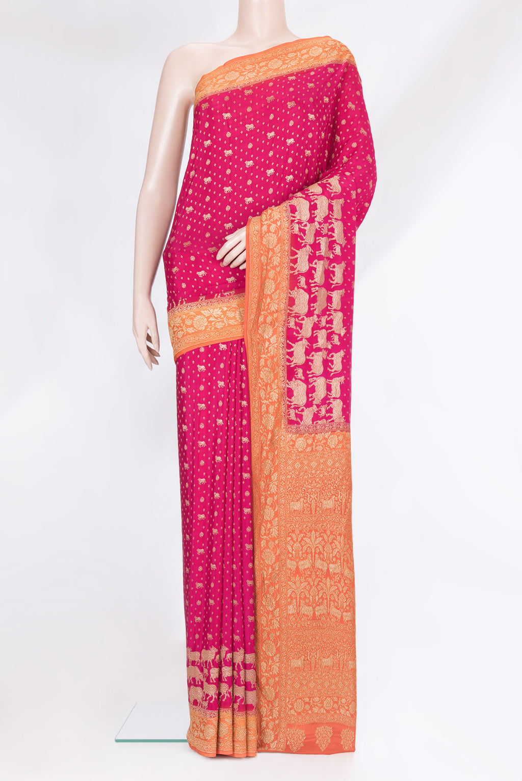 Pink Banarasi Georgette Saree with Zari Brocade on the body and Zari Border.  displayed on a mannequin