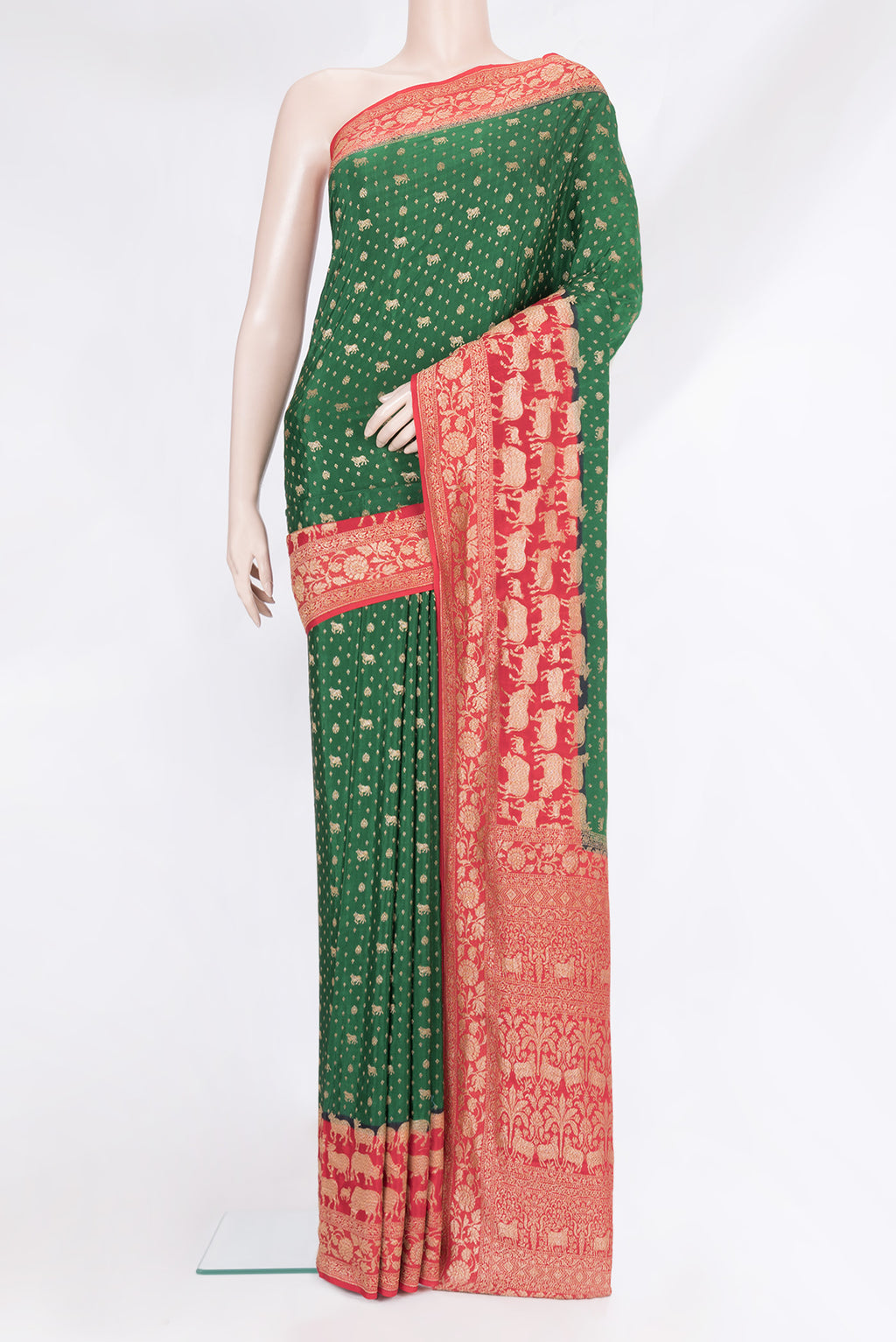 Bottle Green Banarasi Georgette Saree with Zari Brocade on the body and Zari Border.  displayed on a mannequin