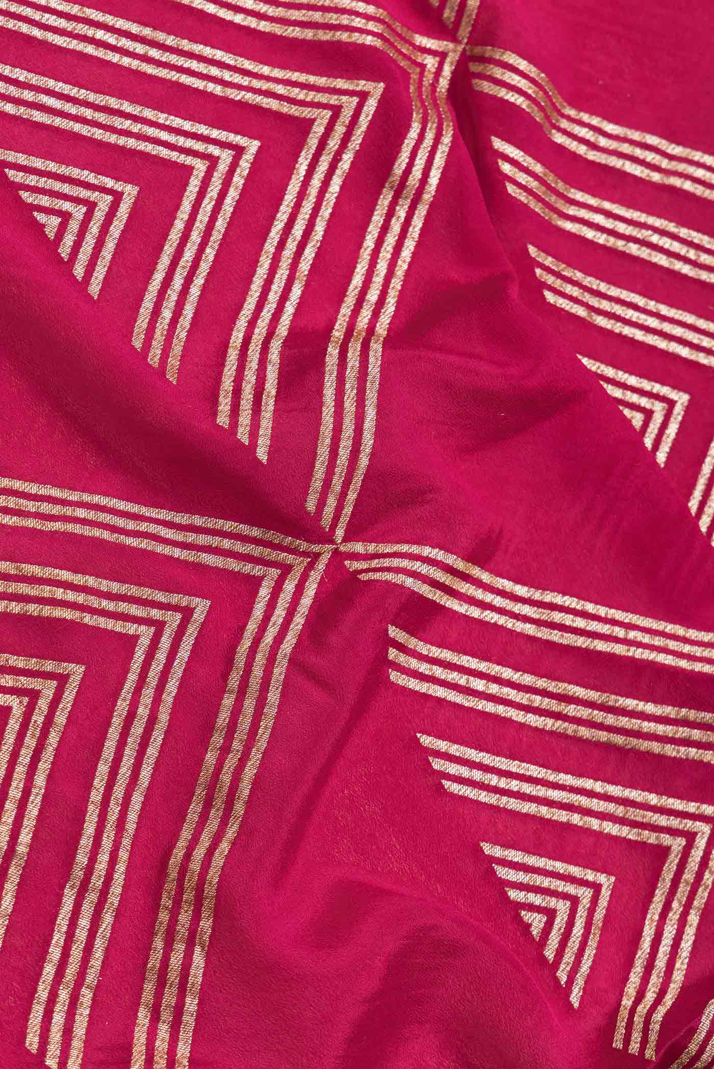 Close up of Pink Dual Tone Banarasi Georgette Saree with Zari Brocade on the body and Zari Border.  displaying folds
