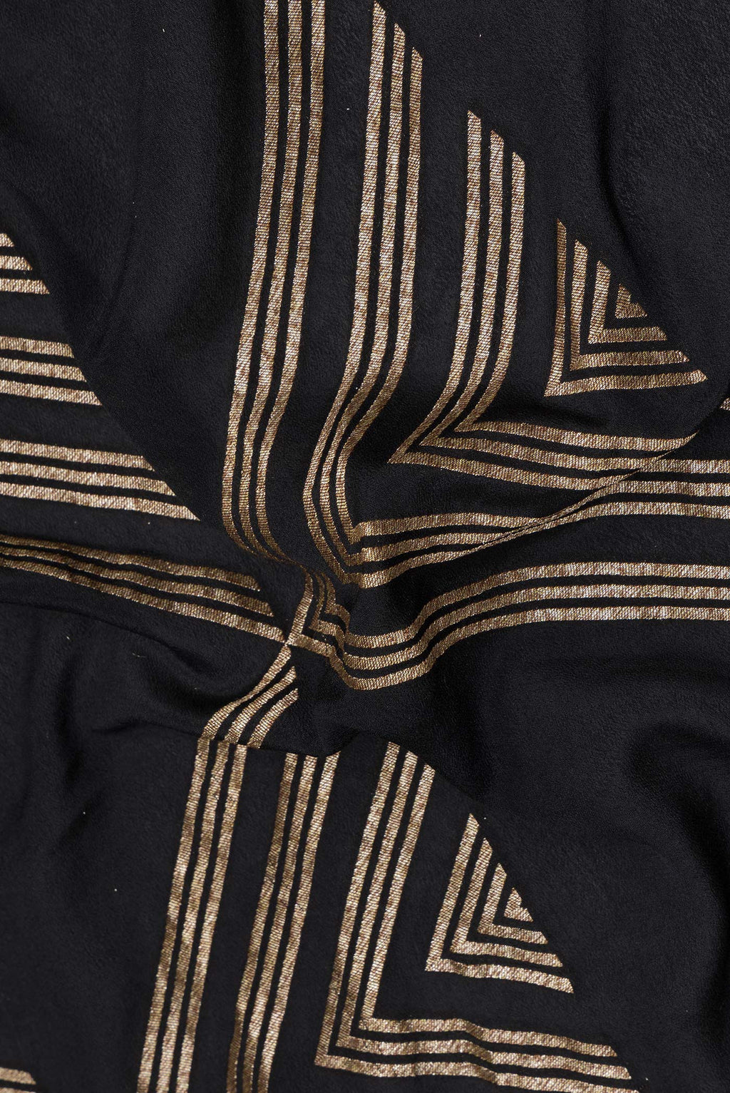 Close up of Black Banarasi Georgette Saree with Zari Brocade on the body and Zari Border.  displaying folds