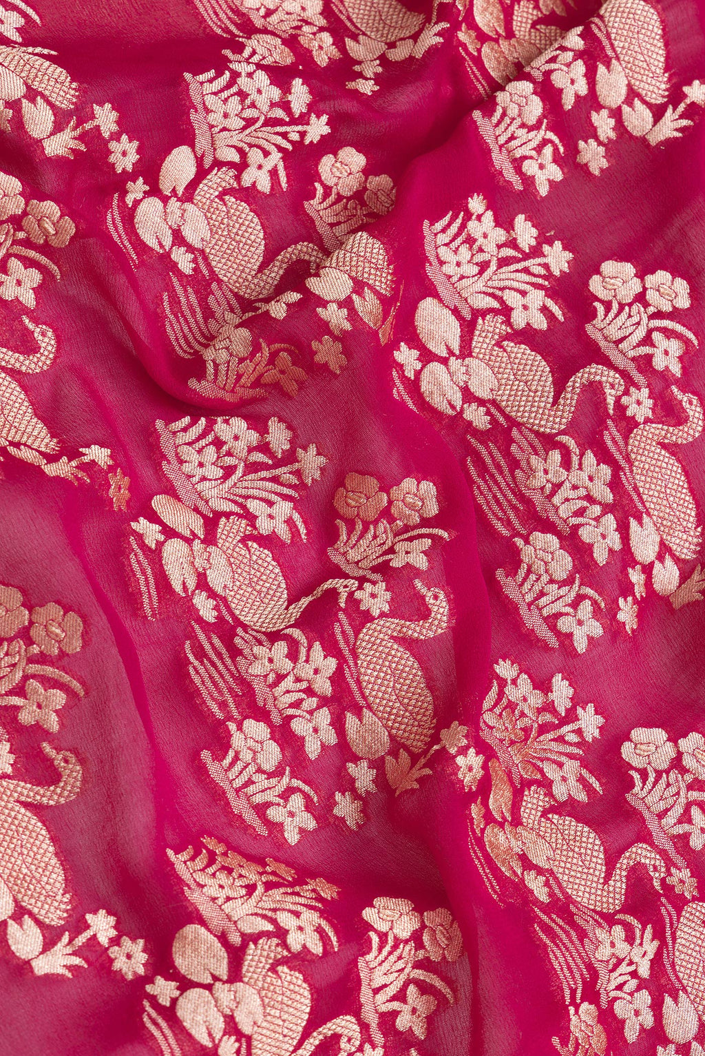 Close up of Pink Dual Tone Banarasi Georgette Saree with Zari Brocade on the body and Zari Border.  displaying folds