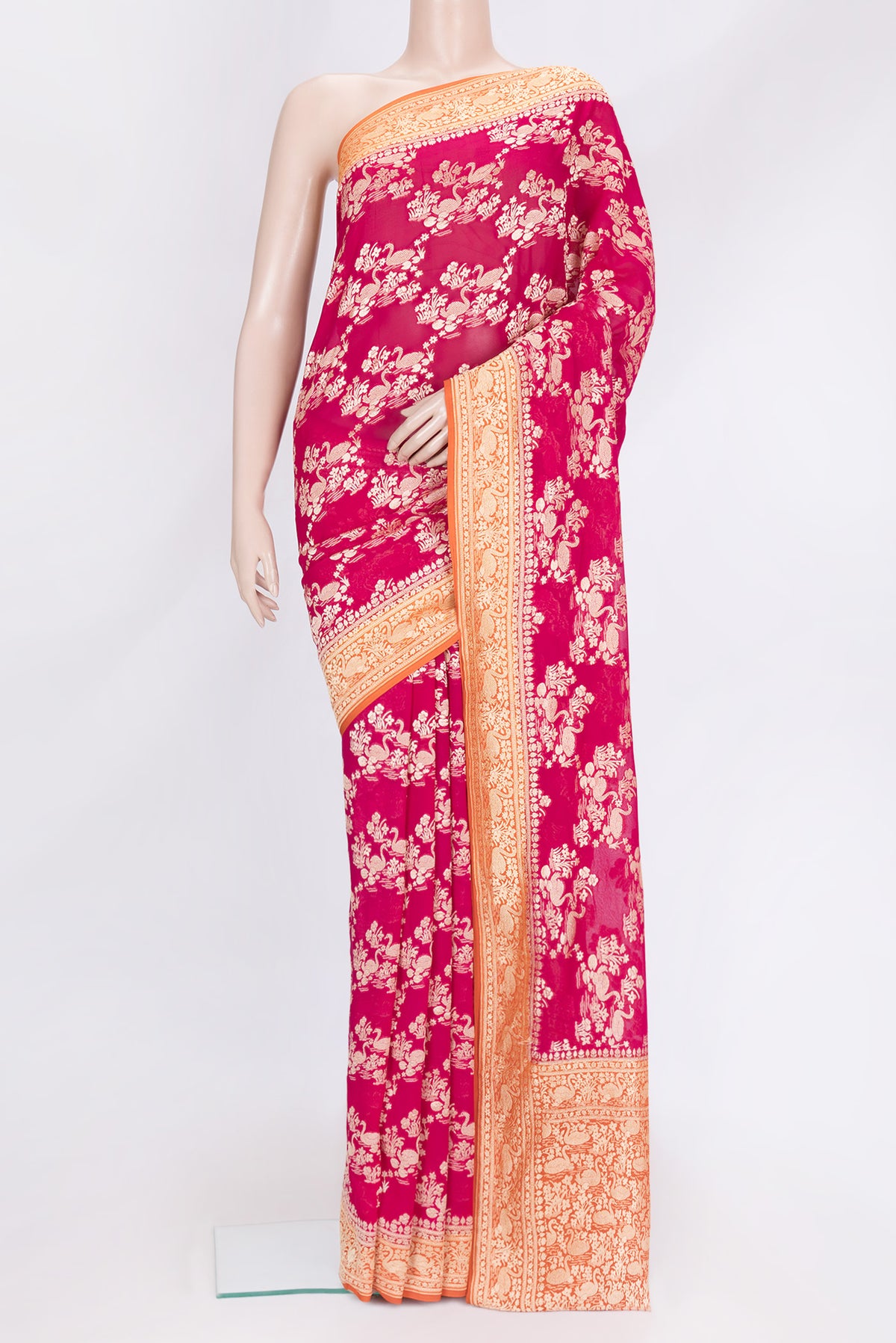 Pink Dual Tone Banarasi Georgette Saree with Zari Brocade on the body and Zari Border.  displayed on a mannequin