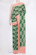 Bottle Green Banarasi Georgette Saree with Zari Brocade on the body and Zari Border.  displayed on a mannequin