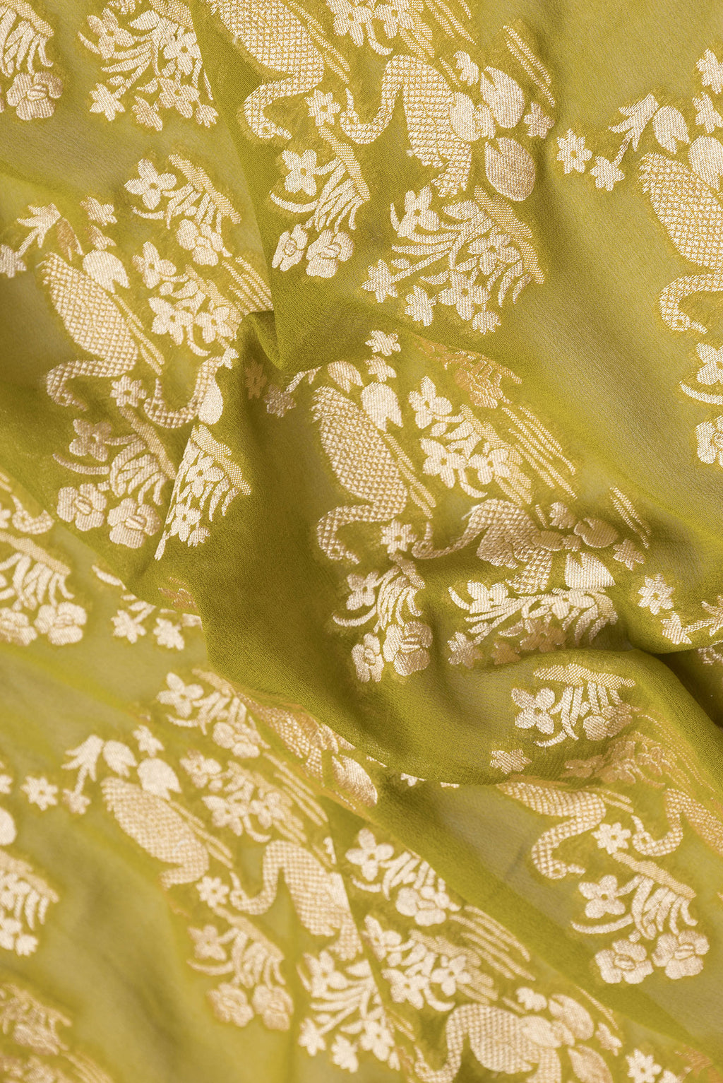 Close up of Mehandi Green Dual Tone Banarasi Georgette Saree with Zari Brocade on the body and Zari Border.  displaying folds