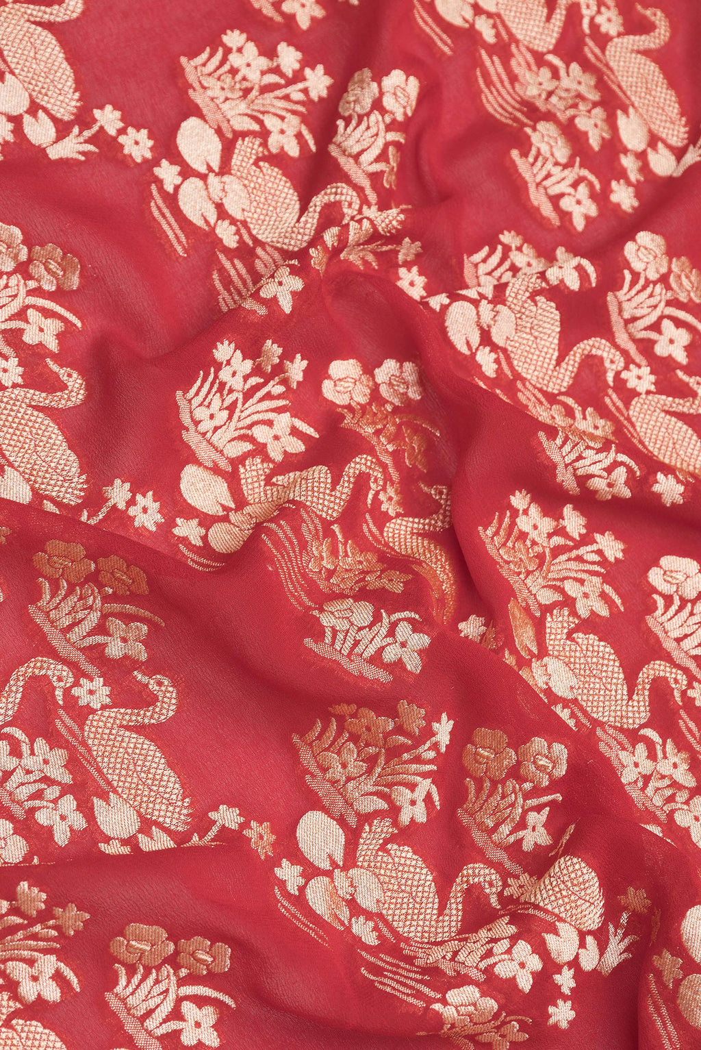 Close up of Red Dual Tone Banarasi Georgette Saree with Zari Brocade on the body and Zari Border.  displaying folds