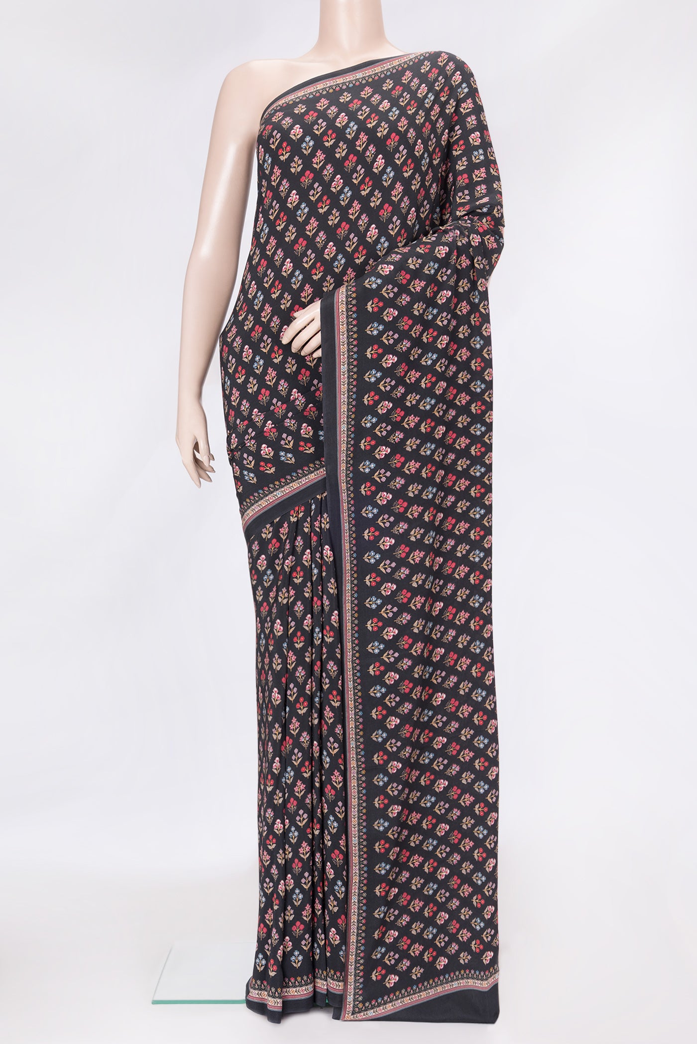 Black Dual Tone Mysore Crepe Saree with Printed design on the body and Printed Border.  displayed on a mannequin