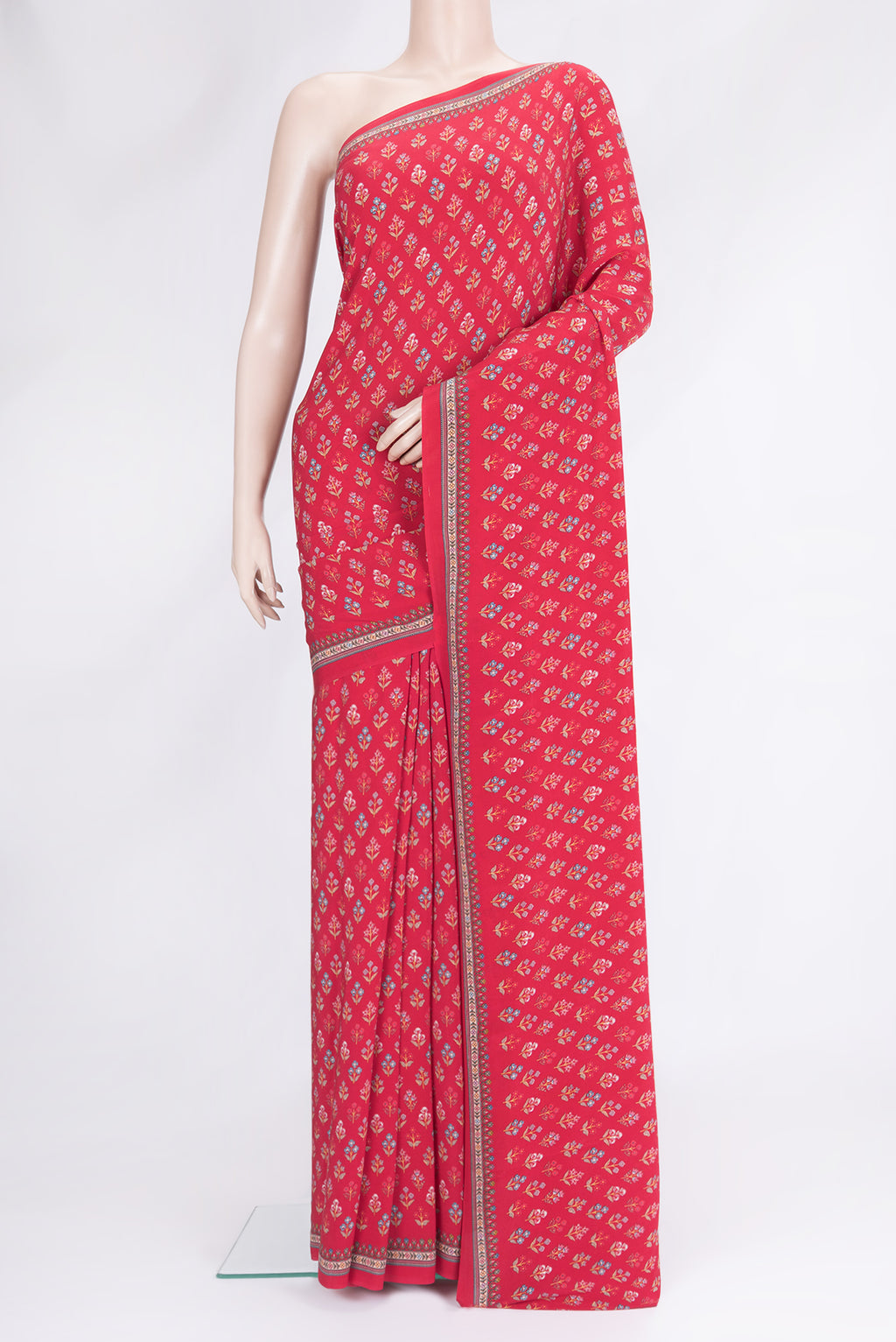 Red Dual Tone Mysore Crepe Saree with Printed design on the body and Printed Border.  displayed on a mannequin