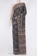 Black Crepe Saree with Bandhani Print on the body and Printed Border.  displayed on a mannequin