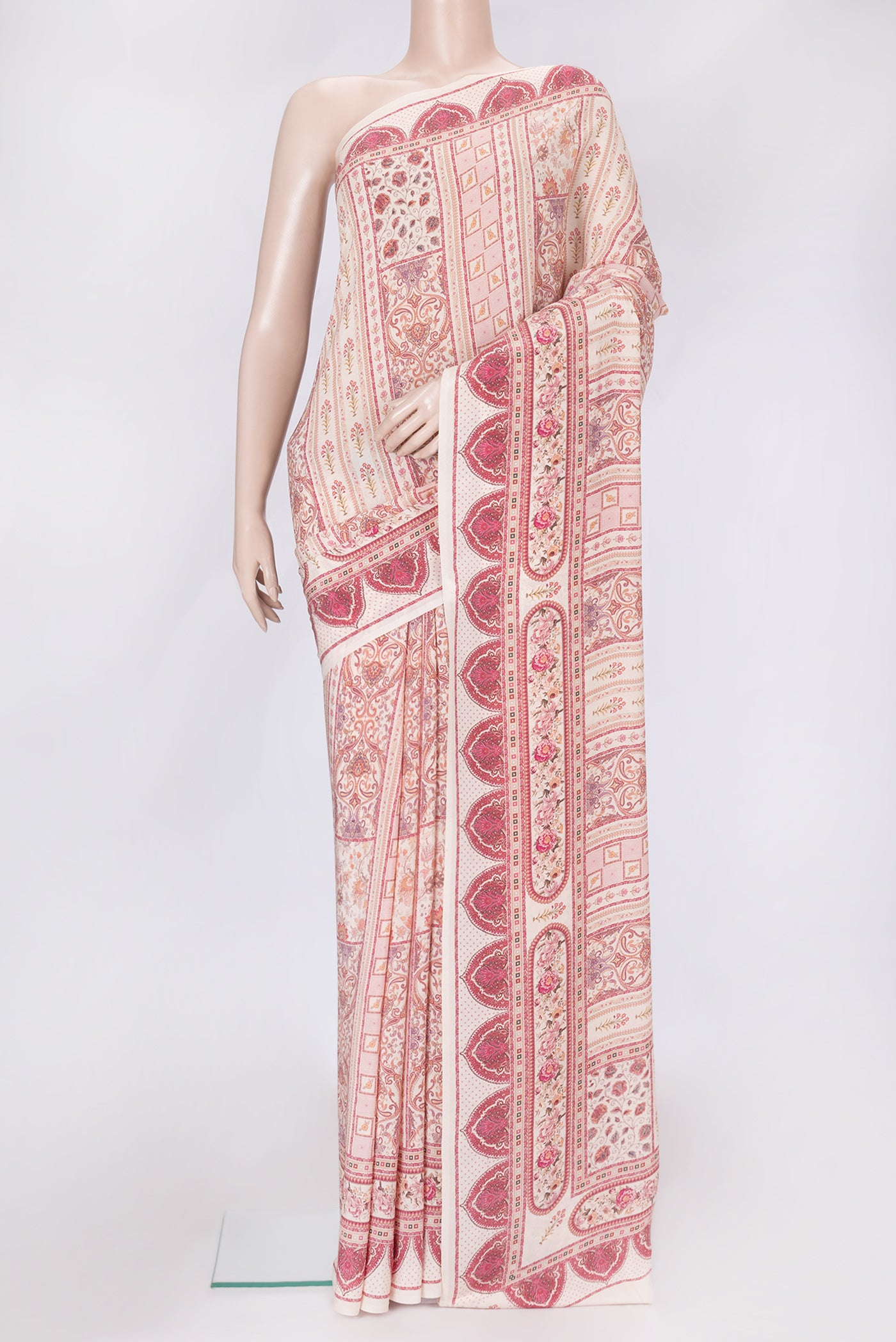 Beige Dual Tone Mysore Crepe Saree with Printed design on the body and Printed Border.  displayed on a mannequin