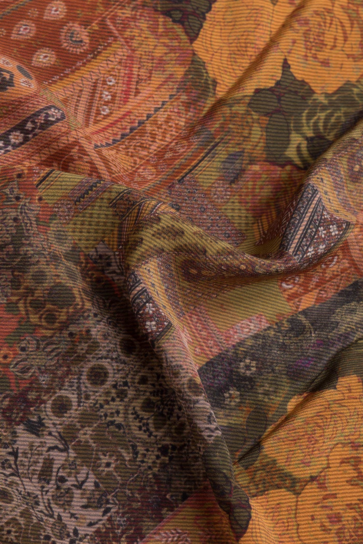 Close up of Green Dual Tone Mysore Crepe Saree with Printed design on the body and Printed Border.  displaying folds