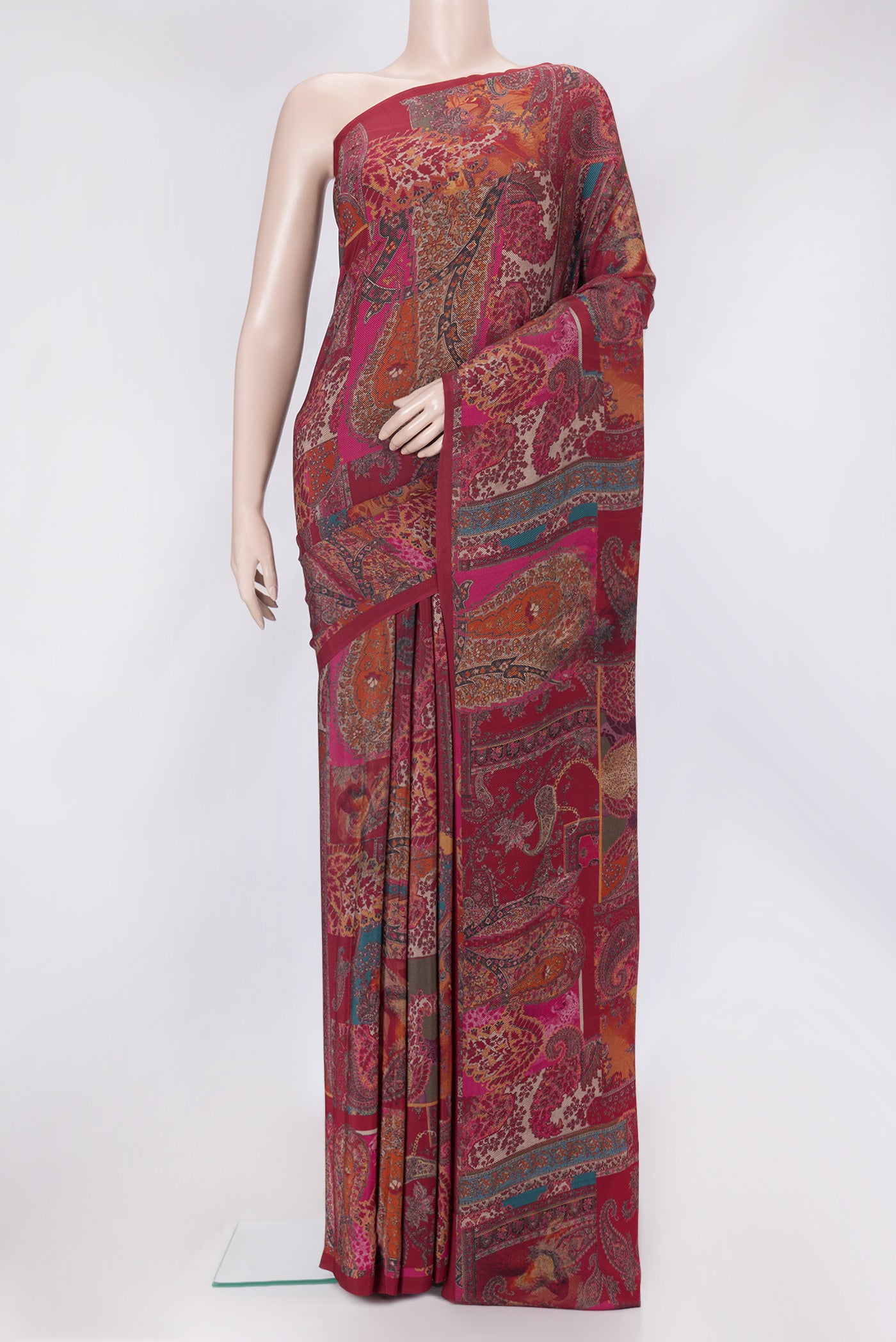 Maroon Dual Tone Mysore Crepe Saree with Printed design on the body and Printed Border.  displayed on a mannequin