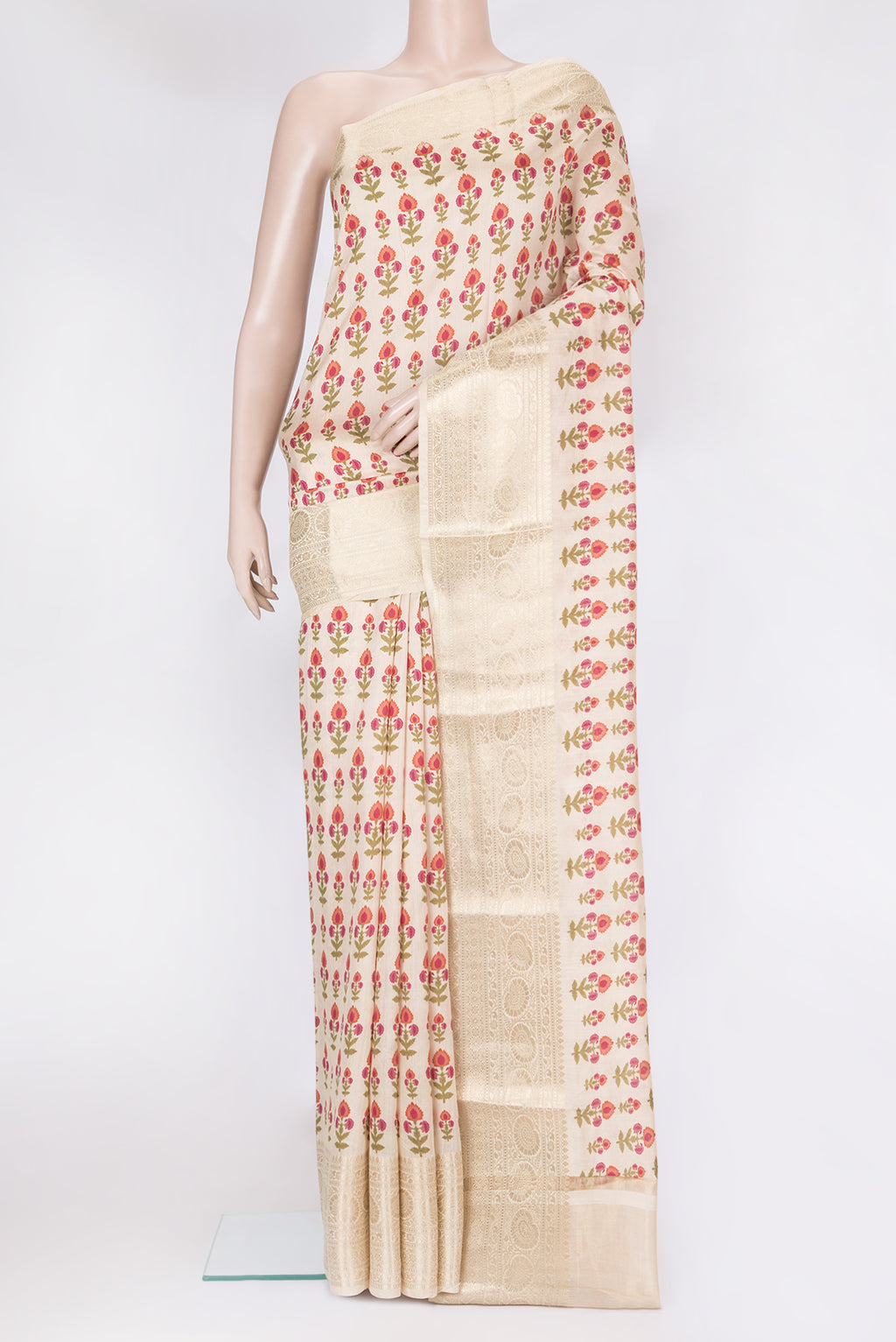 Beige Chanderi Silk Saree with Printed design on the body and Fancy Border.  displayed on a mannequin