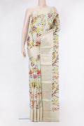 Pista Green Tussar Silk Saree with Printed design on the body and Zari Border.  displayed on a mannequin