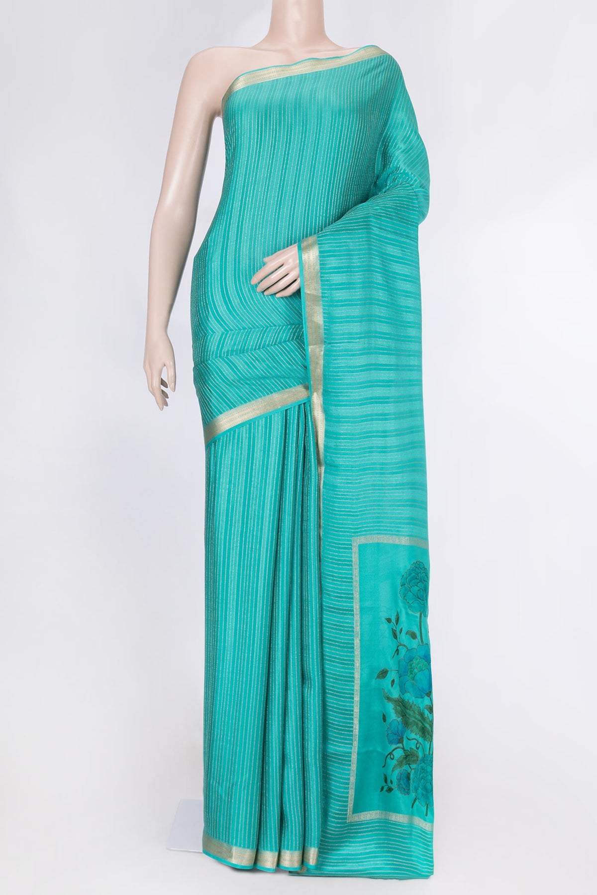 Sky Blue Mysore Crepe Saree with Stripes on the body and Zari Border displayed on a mannequin