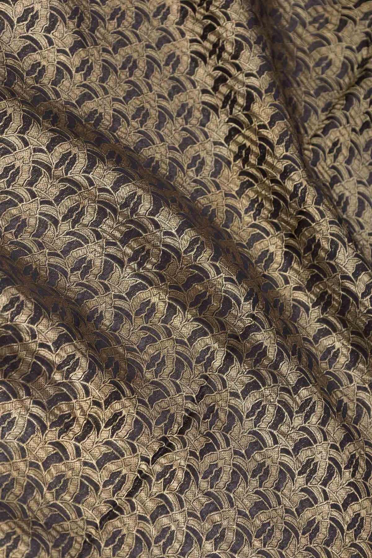 Close up of Black Mysore Crepe Saree with Zari Brocade on the body and Zari Border displaying folds
