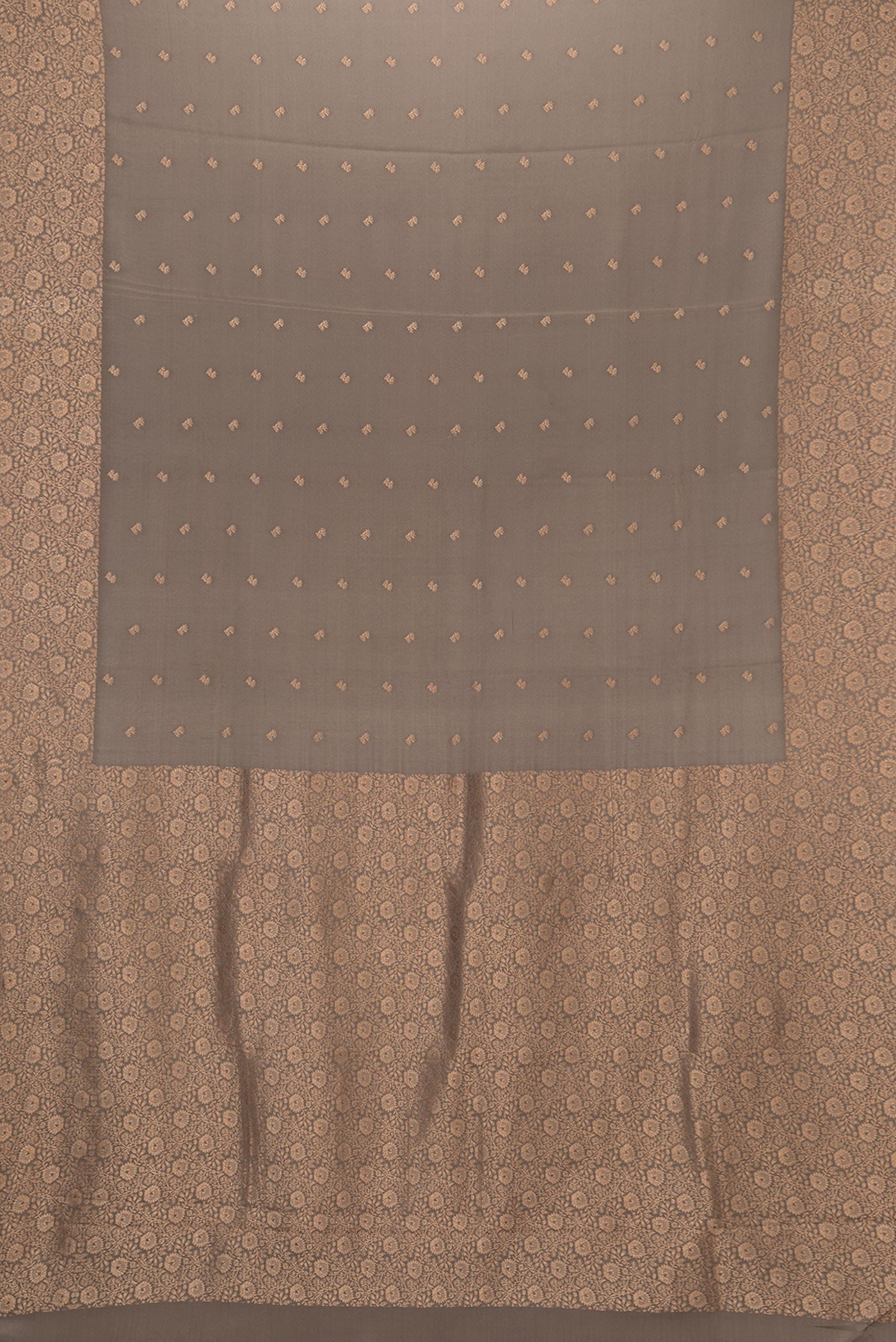 Flat view of Brown Dual Tone Mysore Crepe Saree with Zari Butta on the body and Zari Border. 