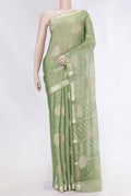 Green Dual Tone Mysore Georgette Saree with Zari Brocade on the body and Zari Border displayed on a mannequin