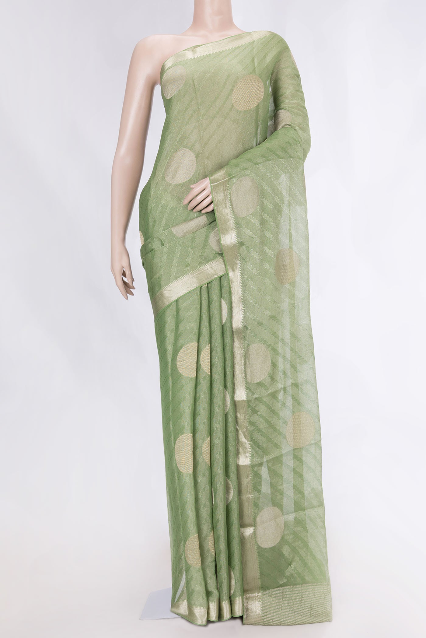 Green Dual Tone Mysore Georgette Saree with Zari Brocade on the body and Zari Border displayed on a mannequin